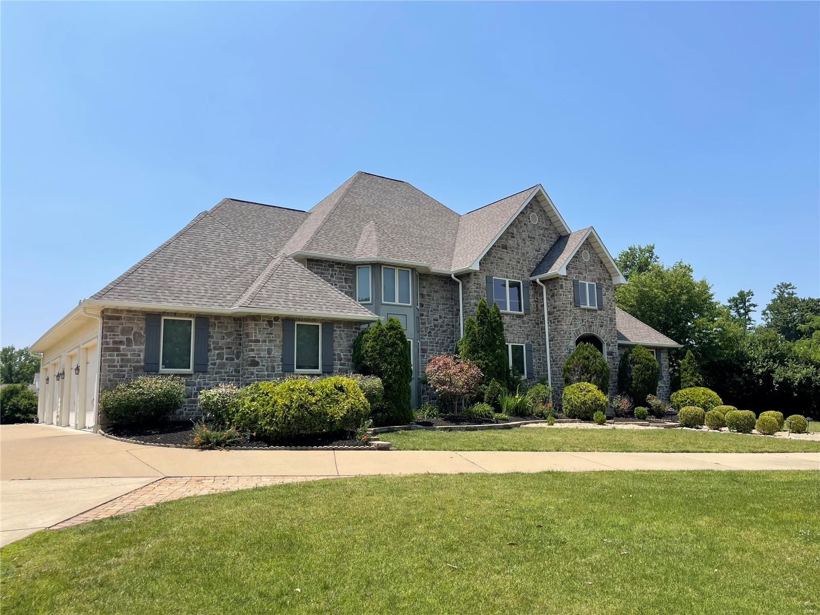 Welcome to this BEAUTIFULLY APPOINTED 1.5 story home situated on a 1 acre lot! You will LOVE the 10 ft ceilings, 8 ft doors, an entry w/SOARING CEILINGS & ENGINEERED WOOD FLOORS throughout the main level! To the left of the entry is a COZY SITTING ROOM w/ a STONE F/P & WOOD MANTLE! Work from home in your PRIVATE OFFICE! The main level features a SPACIOUS OWNERS SUITE AND a JUNIOR  SUITE! The owner’s suite has COFFERED CEILINGS & a LARGE WALK IN CLOSET! The ENSUITE has a DBL ADULT HEIGHT VANITY, a sep tub/shower w/a rainhead & TILE floors & shower surround! The CUSTOM KITCHEN has STAGGERED CABINETS, GRANITE TOPS, DESIGNER 6 BURNER GAS RANGE, a DBL OVEN & SS appliances! There is a BUTLER’S PANTRY w/a wine fridge & SINK! Step out of the dining room to your SCREENED SUNROOM! The living room is just off of the kitchen & has a 2nd GAS F/P! There are laundry rooms on the main & UL! The UL features 3 add’l bedrooms, a JNJ bath and a LARGE LOFT AREA! All of this + a 4 CAR GARAGE! Agent owned. Additional Rooms: Mud Room, Sun Room