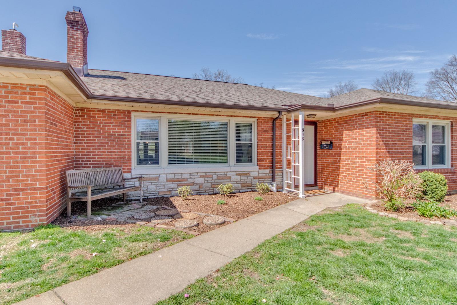 Welcome Home! If you are looking for location, price and move-in ready living, then 849 University Pl. is it! Your spacious, one level home offers light filled rooms, fresh paint, hardwood flooring and 3 generous bedrooms with 2 closets in each and 2 full baths. As you enter, you are greeted by the open floor plan and large windows.  The living room with cove molding and decorative NF wood-burning fireplace opens to the dining room, a perfect place to entertain. Into the kitchen, find plenty of cabinet and counter space, (SS range and refrigerator stay) and the sweetest breakfast room (being used as a home office). Out to the screened porch, perfect for morning coffee and views of the private, partially wooded back yard. The roomy bedrooms allow for plenty of furniture, play space and even another home office. The utility/laundry room, with newer furnace, water heater and electric panel opens to the 2-car, over-sized garage with loads of storage. The roof is 5 years new. Start Packing!