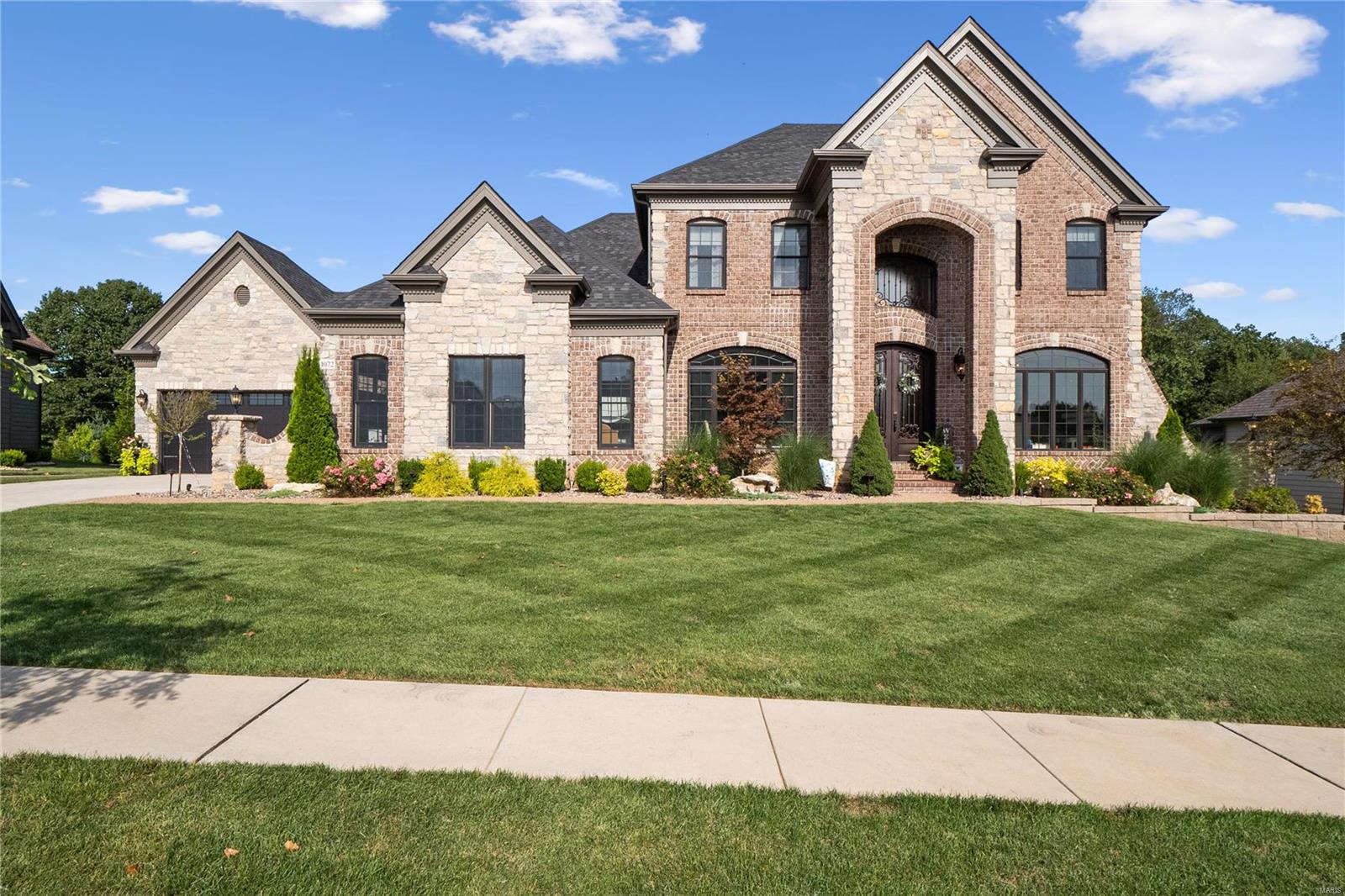 Stunning 2018 built, 6 bed, 4 ½ bath, 4 car garage, 1.5 sty in prestigious Arbors At Wilmas Farm. Extensively upgraded custom finishes throughout home. Chef’s kitchen w/ custom cabinets (glass uppers, lighting), Cambria tops, 48” Wolf cooking, Sub-Zero refrigeration, oversized island, walk-in custom finished pantry, wine fridge & designer lighting! Master suite boasts French doors to outdoor living, luxury bath w/ jet tub, oversized shower, dual vanities, & his/hers outstanding separate walk-in custom closets. 10’ main / LL ceilings, atrium windows, formal dining, upgraded mill / trim work, 8’ doors, crown, wainscoting, built-ins. Finished LL has full bath, wet bar, media room, 6th bedroom & walk in wine cellar. Professional landscape, Resort inspired exterior with expansive custom covered outdoor living, cooking, fireplace & fire features, Pebble Tec pool w/ hot tub! Style exudes in and out w/ custom designer finishes, & it shows. Great for family life & entertaining. Additional Rooms: Wine Cellar