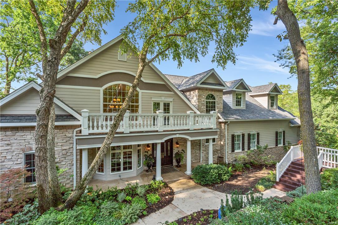 Welcome to elegance, privacy & serenity!  This well-appointed executive home is located on a premium nearly 5 ac lakefront lot in the unique, prestigious gated community of Chesterfield Lakes.  A perfect blend of amenities, carefully chosen finishes & soaring ceilings will appeal to the most discriminating buyer.  This sprawling ranch home has a stunning view of the lake with dock, pool, hot tub, firepit, multiple decks & gathering areas.  Entertain w/ your own resort located in the heart of Chesterfield.  The GR w/ dramatic floor to ceiling limestone FP w/ wall of Palladian windows brings the  outdoors to you.  Dream master w/ private office overlooks lake, FP & gracious dressing areas with opulent  bath.  Remodeled kitchen & hearth is breathtaking with lake views & access to outdoor living areas.  The fin w/o LL offers rec space, wine cellar, wet bar, FP & additional beds & baths for a luxurious guest experience.  Truly, a one of a kind property you must plan to tour today.