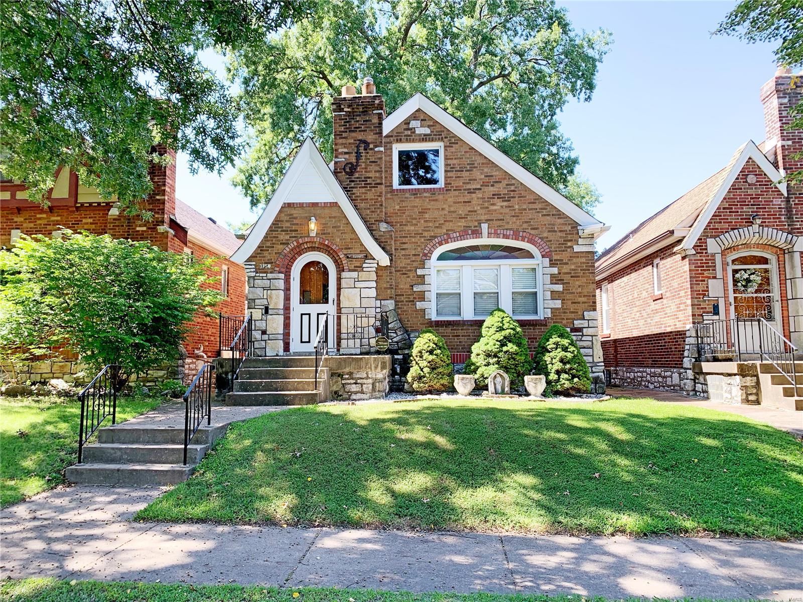 Nice well-maintained brick home. Character abounds in this 2 bedroom one bath Gingerbread bungalow. This lovely home has gleaming hardwood floors in both the living room and dining room. There are beautiful stain glass windows in the living room.The large master bedroom also has hardwood floors and more stain glass windows. The second bedroom has carpeting with hardwood underneath. The eat-in kitchen comes equipped with custom cabinetry, gas stove, dishwasher and refrigerator. The bathroom has been updated. Recent updates also include furnace and roof. The lower level has a bar and endless potential!! Outback you'll find the spacious yard just waiting for your landscaping touch.There is also a one-car parking pad. This home is just waiting for its new owners!!