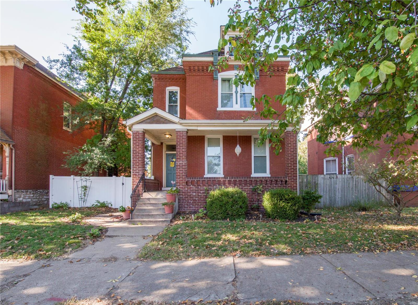 Elegant city living! 130 year old 2 story brick Victorian home has been completely renovated. New thermal windows ($20,000 investment alone!). Updated kitchen with granite counter tops. Newer appliances, and new privacy fencing front and back. Large yard for kids, pets, and entertaining. Large front porch for sitting and watching the world go by. 4 bedrooms, 2-1/2 baths. Original curving staircase to the upper floor. Huge master bedroom suite with private bath, exposed brick with original fireplace. Large walk in closet in the master as well. 1/2 bath off the kitchen, with a butler's pantry too! Full unfinished basement with laundry facilities and tons of storage space. Convenient to Carondelet Park, and Loughborough Commons shopping. Great restaurants in the area such as Stacked, Kicker's Corner, and The Haven. Walking distance to Carondelet Park! Lot's of new renovations on the street. This is a great opportunity to get in on the ground floor of an up and coming neighborhood.