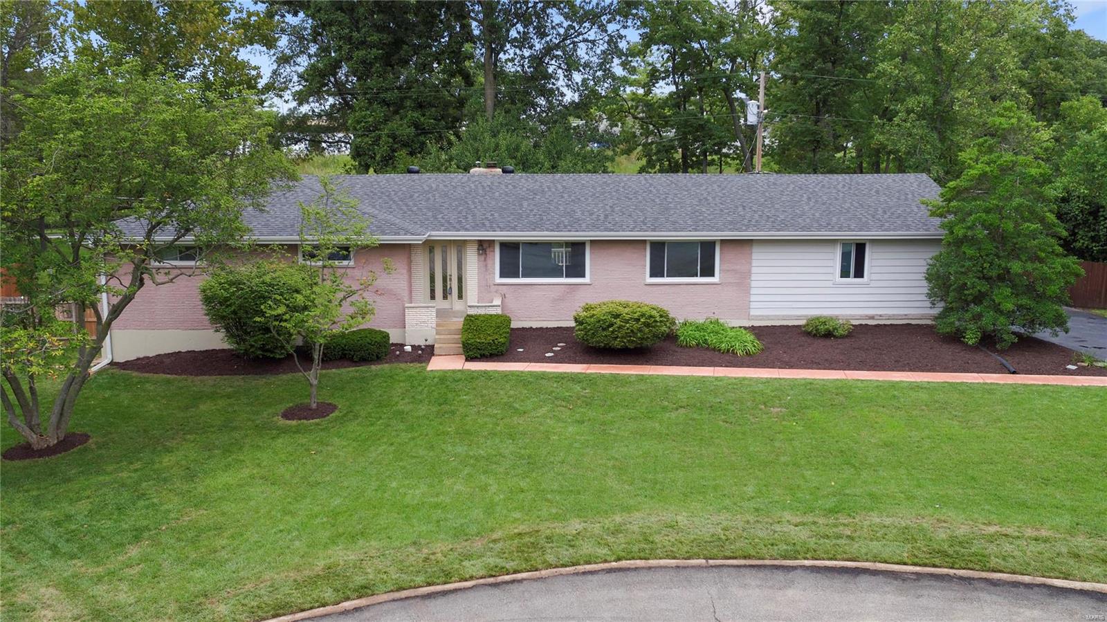 This classic ranch offers terrific price, location, private over sized lot and an in-ground pool. Located on a quiet cul de sac in the
Ladue school district, this charming home is close to a wide variety of shopping, restaurants, and beautiful parks. An open floor plan with refinished wood floors, vaulted ceilings, newer windows and roof. Hearth room has a Wood burning fireplace that’s open to the kitchen with Center island and gas cooktop. The 3 large main floor bedrooms are very spacious and have gleaming hardwood floors. Walk out lower level includes large family room, office and a full bath along with lots of storage. Beautiful, private, fenced in backyard features in ground pool, large deck and patio. Two car side entry garage. Home is being freshly painted on the interior at this time. So many possibilities with this open floor plan to do a beautiful kitchen make over with views to your backyard pool! Showings start on Sunday, 9-2-18 from 1-3 PM