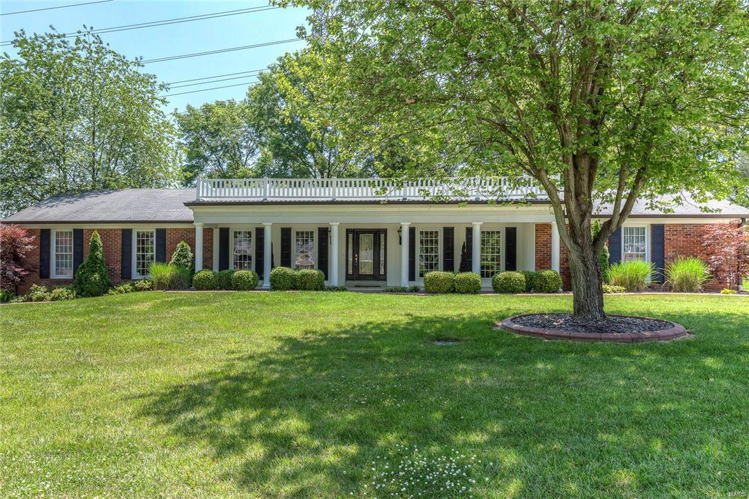 $50k in Total Price Adjustments!! This impressive brick ranch greets you with a sense of arrival and the stylish updates inside are a warm welcome home.  Expansive windows wash the space in natural light and a blend of open and formal rooms offer great entertaining and intimate living.  A chef’s delight, the kitchen features Cherry cabinetry, Viking six burner gas range, Kitchen Aid Architect Series oven, micro, fridge and dishwasher, a center island w/ breakfast bar, granite counters and a large pantry.  The spacious Master Suite is a sanctuary with a jetted soaking tub and separate shower, customized walk-in closet and a double sink vanity.  Additionally there are three guest bedrooms, one full and one half bathrooms. A vaulted ceiling, gleaming hardwood floors throughout, elaborate millwork, two gas fireplaces, central vacuum system, surround sound, stamped concrete patio, half acre level yard and two car garage complete the move in ready experience…Welcome Home!