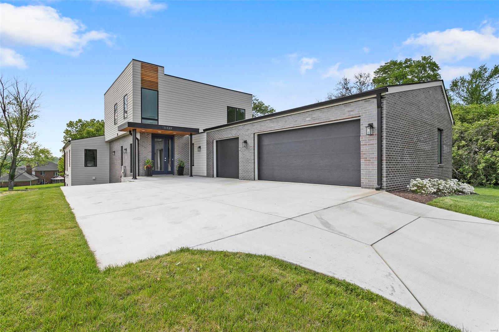 With its modern flair, open floor plan, high-end finishes and central location, this new build is a must see! The main level boasts a stunning kitchen with large center island, six burner cooktop, double ovens, microwave drawer, coffee nook and opens to the dining area and great room. Off the great room & sharing a 2 sided fire place is a light filled sitting area which feels like a sunroom. The primary main level suite is spacious and offers two large walk-in closets. An additional sitting area which can also be a a more private dining option, a large laundry room, mud room & powder room complete the main level. The upper level has 2 additional graciously sized bedrooms and a hall bath. The walk out lower level has the same level of finishes as the main level and offers an entire additional living space with separate office, open kitchen/dining/great room, ensuite bedroom, another bedroom, full hall bath and laundry room - perfect for multigenerational living. 3 car garage!