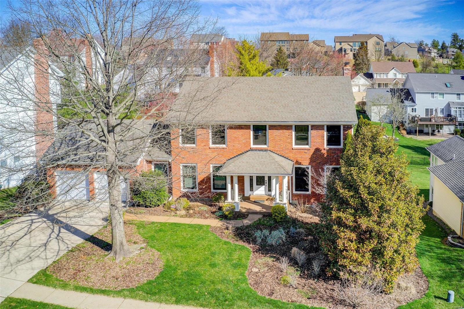 A must see home in Des Peres that has been updated in every way. Enjoy the features that include new Andersen windows in 2020, Acacia hand scraped hardwood on main level and 9 foot ceilings, deep pour in finished lower level, added front porch roof, LP Smart Siding, oversized gutters with screen covers and downspouts, and Trex deck. Cozy family room has gas fireplace and wet bar and opens to living room. The kitchen was remodeled 8-10 years ago and includes a center island, granite counters, 42 inch cabinets, stainless appliances, electric cook top and microwave, built in double ovens, and walk in pantry. In 2019 master bath completely remodeled and includes heated tile floors, free standing soaking tub, separate shower and double sinks. Breakfast room has beamed ceilings and ventless gas fireplace. Main floor laundry off kitchen. Newer front and back doors, updated walk out lower level with rec space, tv area, bedroom and full bath with large storage areas. Sirva mortgage available.