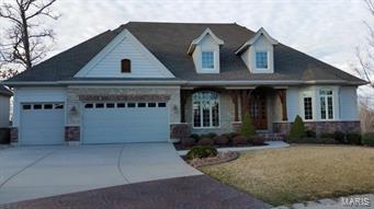 This is a small, private cul de sac that was designed for the discriminating buyer looking to “right size” their lifestyle without giving up luxurious space for entertaining and family!  “Chef Quality” kitchen w/Viking range & hood, center island & brk bar & access to grilling deck is open to the Breakfast rm, FR, DR and GR. Custom ceiling treatments, moldings, and staircase.  A main floor master suite that is spacious with large organized closets, a coffee bar, and fabulous bath! 3 car garage. Main Lvl Laundry. And a finished walk out LL with 3 extra bedrooms, 1 ½ baths plus a big family room with sit down bar.  A screened deck and a screened patio with fire pit round it out.  And to top it off – You are right across the street from Lake Forest Country Club for golf, tennis, swimming, pickle ball, and a wonderful dining experience! Additional Rooms: Sun Room