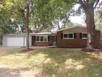 Wow! Beautifully renovated 3bdrm, 2 bath Ranch with 2 car garage close to downtown Kirkwood! Additional highlights include:  Gleaming wood flooring in Living Room, Dining Room, and bedrooms! Spacious living room& dining room w/ floor to ceiling Gas Stone fireplace!  New kitchen 2015 with GRANITE countertops and upgraded Stainless appliances!  Panel Doors! Thermal windows 2015! Vinyl Siding 2015!  Low maintenance partial Brick exterior w/ enclosed soffits and fascia! Gutters 2015!  Electric panel 2015!  Updated plumbing! Roof 2015! Both full baths updated 2015!  Great additional space in partially finished lower level! Level fenced yard with patio!  Oversized 2 car garage with new door and opener 2015! New lighting throughout home 2015!  HSA Home Protection Plan free to BUYER! Quiet cul-de-sac!  Close to Kirkwood shops, restaurants, park & more!