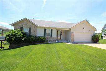 Incredibly clean & well-maintained ranch in the desirable Winter Valley subdivision. Home sits on a cul de sac lot with a nicely groomed lawn. Roof replaced in November of 2014.  Freshly painted great room, hallway, master bedroom, front corner bedroom, and both main level bathrooms. Patio & large deck provide room for entertainment. Nice sized great room with cathedral ceiling. Walk-in kitchen pantry. Main floor laundry. Over 500 sq/ft of lower level finish featuring 6' windows that provide plenty of natural light. Lots of storage space in walk-out lower level.  Conveniently located near shopping at Gravois Bluffs.  Seller believes that drywall is present beneath basement paneling.