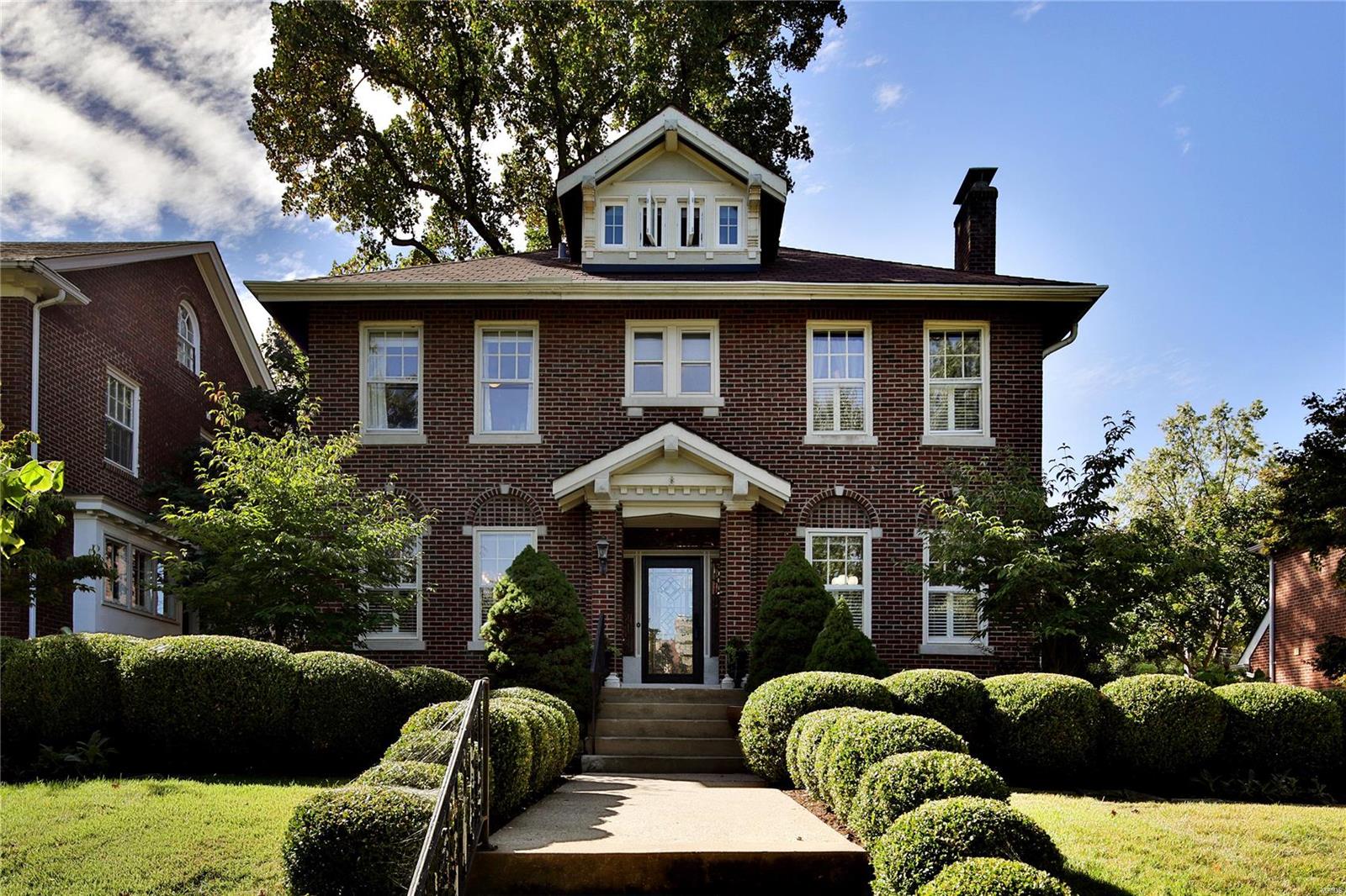NEW PRICE!! Stunning & classic 4 bedroom, 4.5 bath Clayton's Hillcrest neighborhood! This house has a special history--it was formerly occupied by renowned playwright Tennessee Williams! Leaded glass windows, gorgeous millwork, & hardwood flooring are seamlessly blended with updates for today's at-home living style. The living room has a gas fireplace & is flooded with natural light, & both living and dining rooms boast 9' ceilings. The kitchen has newer stainless appliances & granite countertops, with adjoining breakfast room. Upstairs, the master suite is a calming retreat with a newly renovated master bathroom. Two other bedrooms share a hall bath, & fourth bedroom is a perfect guest suite on the third floor. A finished family/rec room in the lower level and bonus workout room offer flexible convenience. A wonderful deck & pergola overlook the professionally landscaped, picture-perfect yard, with a 4-car carport beyond. Amazing opportunity in one of Clayton's favorite neighborhoods!