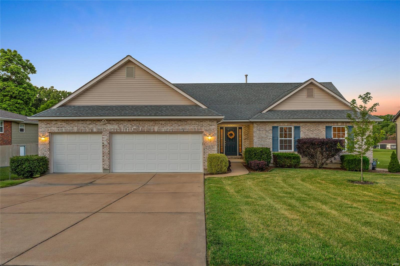 Outstanding Ranch home! Enter to the beautiful vaulted living room with hardwood flooring & vented gas fireplace to cozy up to. Lots of open space. The kitchen is complete with gorgeous 42" custom cabinetry and breakfast bar- this with the nice sized dining area gives you great entertaining space! Off the kitchen toward the garage you have main floor laundry room with a laundry sink- the 3 car garage also has a bump out that gives you even more space. The hallway bathroom is a large full bath- bedrooms 2 and 3 are great sized rooms. The main bedroom suite has great space, large closet and the full bathroom suite. The unfinished lower level gives you an additional 1800(+/-) square feet to design for your needs- you can easily add a lower level bathroom with the rough in already in place for you. Step out to your deck overlooking your large patio and backyard and wait until you see that detached garage! A car lovers dream! Hurry before this one is gone!