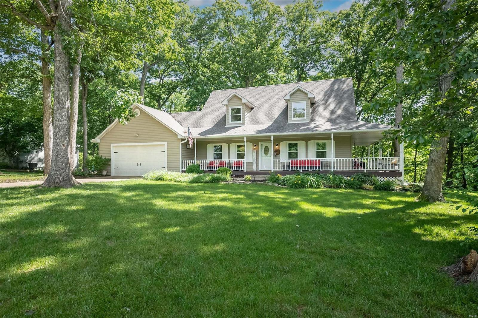 Home sweet home is what you'll say as you step inside this adorable 1.5 story, 2-bed/2.5 bath home sitting on a private 1-acre lot, in the desirable subdivision of "Isaac Kent Farm."  Right away you will fall in love with the wrap-around covered porch, a coffee lover's oasis! Upon entering the home, you will notice the grand staircase and vaulted ceiling. The home boasts an open floorplan with a main floor laundry and recent updates to include fresh paint, new windows in living room/dining room, all new custom kitchen cabinets, center island, tile backsplash, walk-in pantry, quartz countertops, stainless-steel appliances, and main floor bath. The main floor has stunning hardwood floors throughout, a wood burning fireplace with a circulating fan and separate dining room with a built-in bookcase. The upper level offers a loft, master suite with private full bath, and a walk-in closet. The partially finished LL offers an exercise room, sleeping area, and a half bath. Welcome Home!