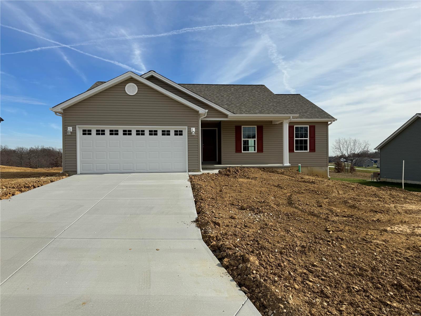 MOVE IN READY!! Why buy an older home when you can have everything brand new? This "Grace" model features 1295 sq ft 3 bedroom, 2 baths & 2 car garage ranch home in a great community on nice 1/2 acre. The open floor plan welcomes you w/upgraded vinyl plank flooring, recessed can lights, vaulted ceiling in living room & kitchen, stainless steel appliances, granite countertops, ceiling fans in living room and master, brushed nickel hardware, & master bedroom w/full bathroom. Enjoy the main floor laundry, walk in master closet, & the views from your front porch. The full basement includes bathroom rough in for your future finished expansion. The exterior of home features maintenance free vinyl siding, architect shingles, & patio for your entertaining needs. Home comes with 1 year Upkeep building plus limited warranty. VA, FHA and USDA zero down financing eligible home.
