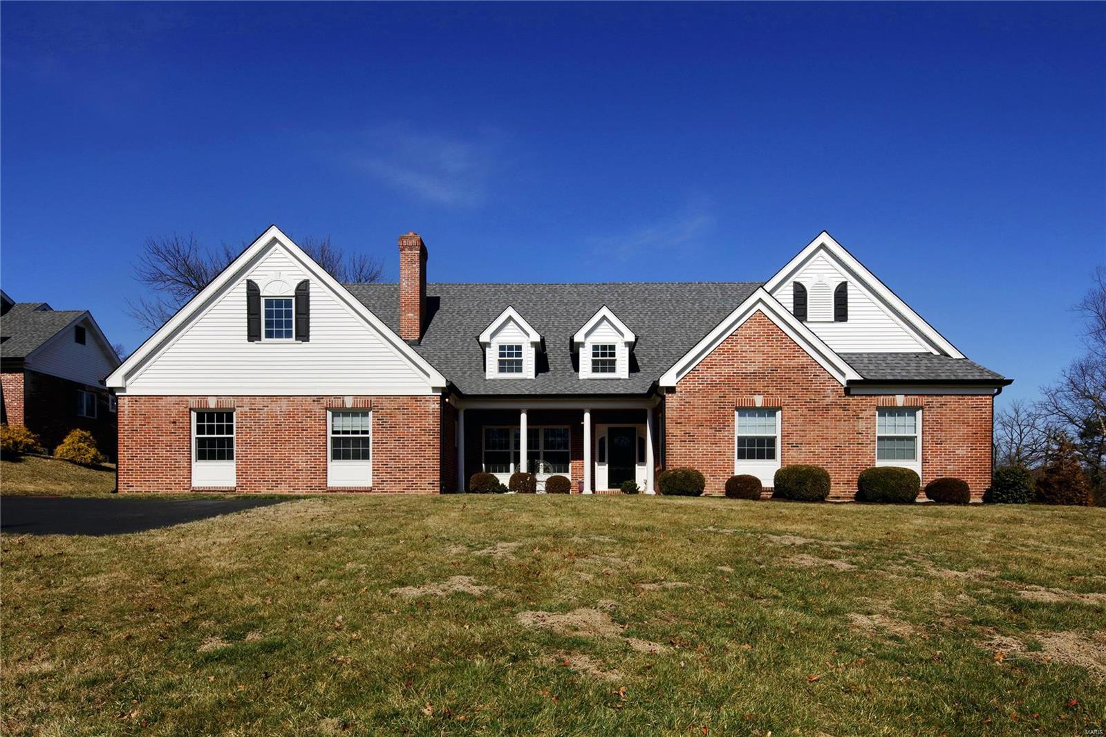 Fantastic opportunity in Frontenac and Kirkwood Schools! Well maintained 4,084 sq ft, 1.5 story home w/ 4 beds, 3.5 baths & attached 3 car garage on 1.13 acre lot. First floor features hardwood floors, dining room, living room, family room, 2 fireplaces, sitting room, & laundry room. Main floor master bedroom suite has 2 French doors to covered rear porch & nearby nursery/office. En suite master bath w/ white marble counters, surround, & floors has air tub, steam shower w/ bench, double vanity, water closet, & walk-in closet. Center island kitchen w/ granite counters, Wolf 4 burner gas cook-top, stainless steel Bosch appliances, & breakfast area w/ wet bar. Second floor has 2nd bedroom suite w/ en suite bath & walk-in closet, loft, upstairs laundry w/ stacked washer/dryer, bedrooms 3 & 4 w/ walk-in closets share Jack & Jill bath. Attached over-sized 3 car garage, full unfinished basement, covered front & rear porches, rear terrace, & large level backyard. This is a must see property!