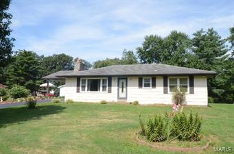 Almost 1400sq ft ranch on a large, level ¾ acre lot is available now! Special features include hardwood floors throughout (including under bedroom carpet in one of the bedrooms), woodburning fireplace, eat in kitchen and separate dining room and 2 full baths.  You’ll love the updated hall bath with double sinks and linen closet!  The lower level has a full bath and is ready for your finishing touch to make it just how you want….endless possibilities.  There is currently a carport but there is so much room here that you could easily make it a 2 car garage (or more), have a pool, a playground, a garden and still have room for any other outdoor activity!  A little tlc will go a long way in this home!