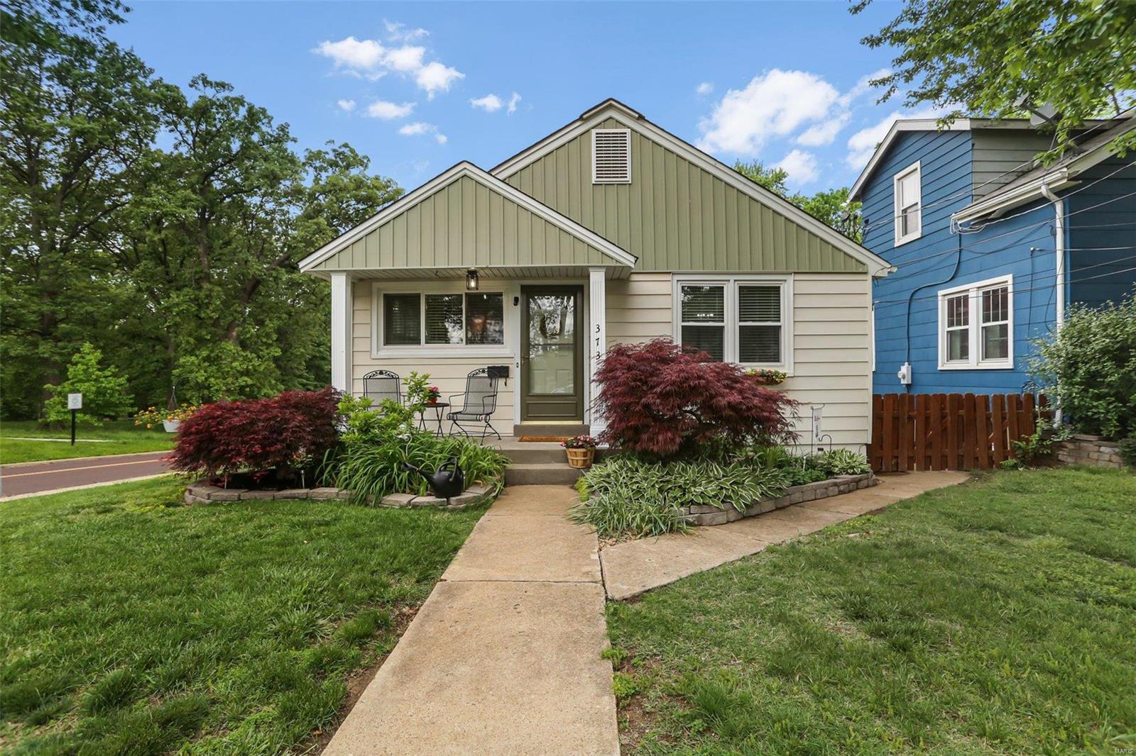 With a pool in the backyard and Blackburn park in the front this adorable craftsman bungalow will have you perfectly geared up for summer! Main floor features hardwood floors, new lighting throughout, newly renovated bathroom with walk-in shower and main floor laundry available (also available in LL). Cottage kitchen offers built in pantry, Bosch refrigerator and plenty of cabinet space. The finish on the lower level has the opportunity for a large rec/family area, additional bedroom or office and a full bath.  The front and backyard are beautifully landscaped with a wooden privacy fence, covered patio with 2 ceiling fans, and did we mention the in-ground salt water pool?!  To boot there is a heated 2 car garage and all windows on the main floor of the home were replaced 6 years ago. Blackburn Park is 38-acre park with picnic areas, walking trails, ball fields, tennis courts and a bird sanctuary.  Location of this one can't be beat!