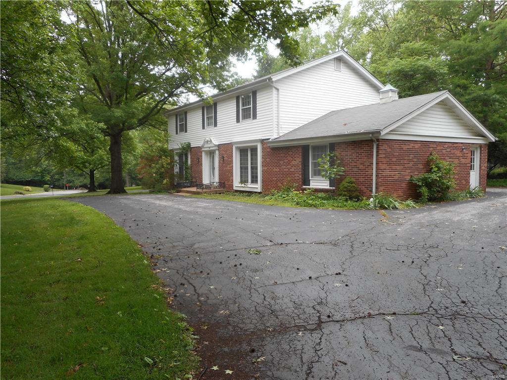This 4 bedroom 2.5 bath with almost 2700 SF sits on a large corner lot. Eat in kitchen with center island.  Brick patio.  Formal dining and living room. Also on the main floor are the .5 bath, family and great room.  The 4 bedrooms are on the upper level.  The large Master bedroom also has a sitting area and 3 closets.  The home sits in a cul-de-sac and has a circle driveway. Newer carpet and home is ready for move in