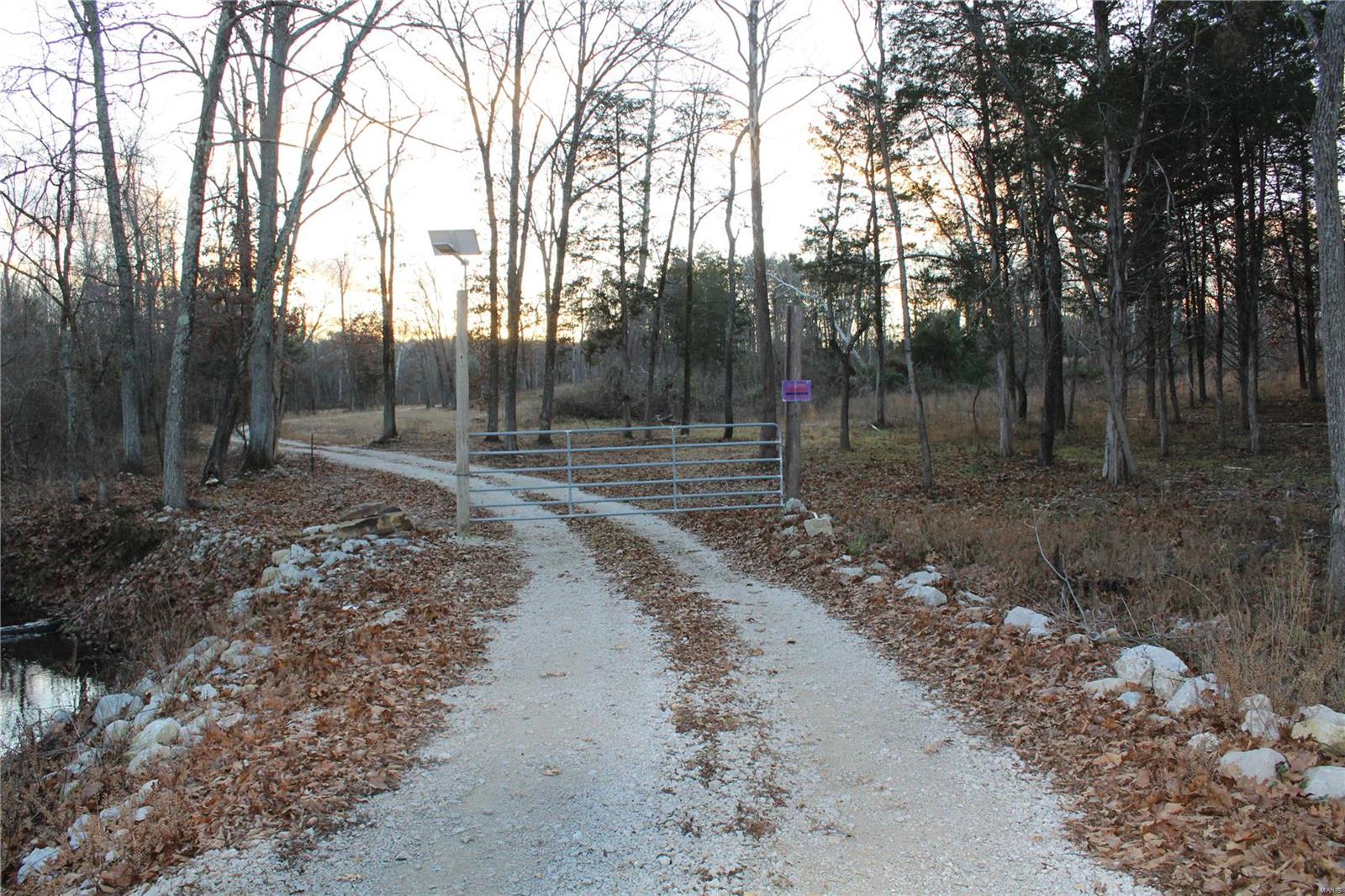 Large acreage properties in this part of Jefferson County are hard to come by, so don’t wait too long to take a look at this one.
Located just outside of Mapaville MO, on the west side of Morgan Road, sits this very nice 80.5+/- acres. Much of the property is mature hardwoods, with a nice building site for your dream home. A winding driveway leads you through well maintained pastures to this pristine building locale, with a nice view overlooking the farm. 
The property is loaded with deer, turkey and other critters.  A live creek runs through the property, and a pond that needs work could also be an added water source for wildlife. The open areas would make perfect food plots to attract and hold wildlife, or pasture for horses or cattle. 
• Property is located just north of Highway A
• Hard road access to the property
• Electric to farm
• Gated entrance
• Located just east of Hillsboro, MO
• Minutes from Festus and Pevely, MO and I-55
• 37 minutes from downtown St. Louis, MO
