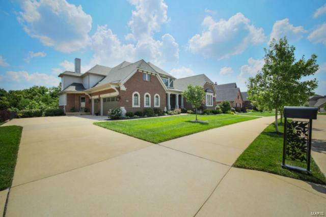 A rare find. 1 of only 5 Elite Hayden-built homes in Reserve At Chesterfield.Amazing, nearly-new, 1.5 story custom home w/ 6500+ sqft of living space, backs to Chesterfield's Riparian Corridor w/acres of privacy & incredible views.Top-of-the-line features include 4 HVAC zones, 8 Baths, 5 Bedrm Suites, 4 fireplaces, Screened-in Porch & covered Patio. Open Kitchen has 2 islands, custom cabinets, granite & top-of-the-line appliances.Professionally finished walkout Lower Level includes 10’ ceilings, Theater Rm with state of the art DLP surround sound, Rec Rm & Wetbar w/ 2nd dishwasher and granite and wood countertops.Main floor Master Suite has its own HVAC zone, huge his/her closets & walk-in shower w/ spa.Unlike other West County premium properties, this gem is only minutes to I-64 & “The Valley”, two outlet malls & walking distance (via nature trail) to parks, amphitheatre and shopping. Only for elite discriminating buyer looking for something WELL beyond the typical subdivision homes.