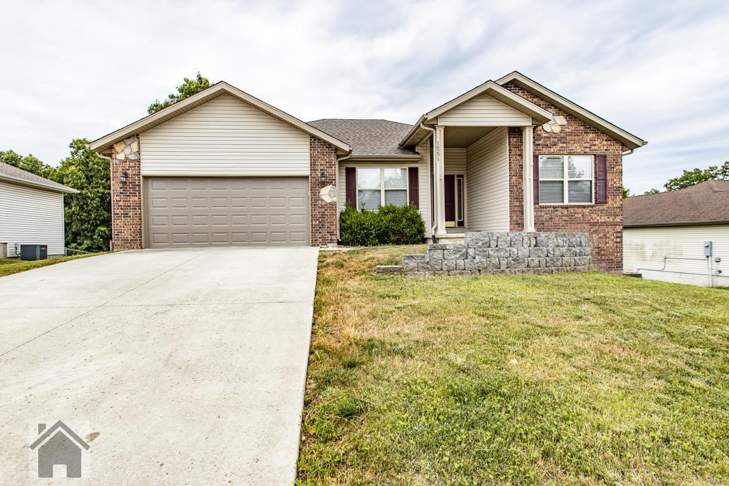 Located in the Osage Hills subdivision is this 5 bedroom 3 bathroom ranch-style home that sits on a full partial finished walkout basement. Step into the open living room where you find laminate wood floors and a vaulted ceiling. The dining area and kitchen highlight ceramic tile floors, recessed lighting, tile backsplash, black appliances, a breakfast bar, pantry and cherry offset cabinetry. The attractive master bedroom features a tray ceiling, walk-in closet and is carpeted for comfort. The charming master bath features ceramic tile, double vanity sinks and tub/shower combo. Head downstairs to the basement where you have two bedrooms, a full bath and a multi-purpose room. Also located downstairs is a tornado shelter and a huge unfinished area which has the potential to be a man cave, a family room or a recreation area. You can head out to the covered back deck and enjoy the wooded view.