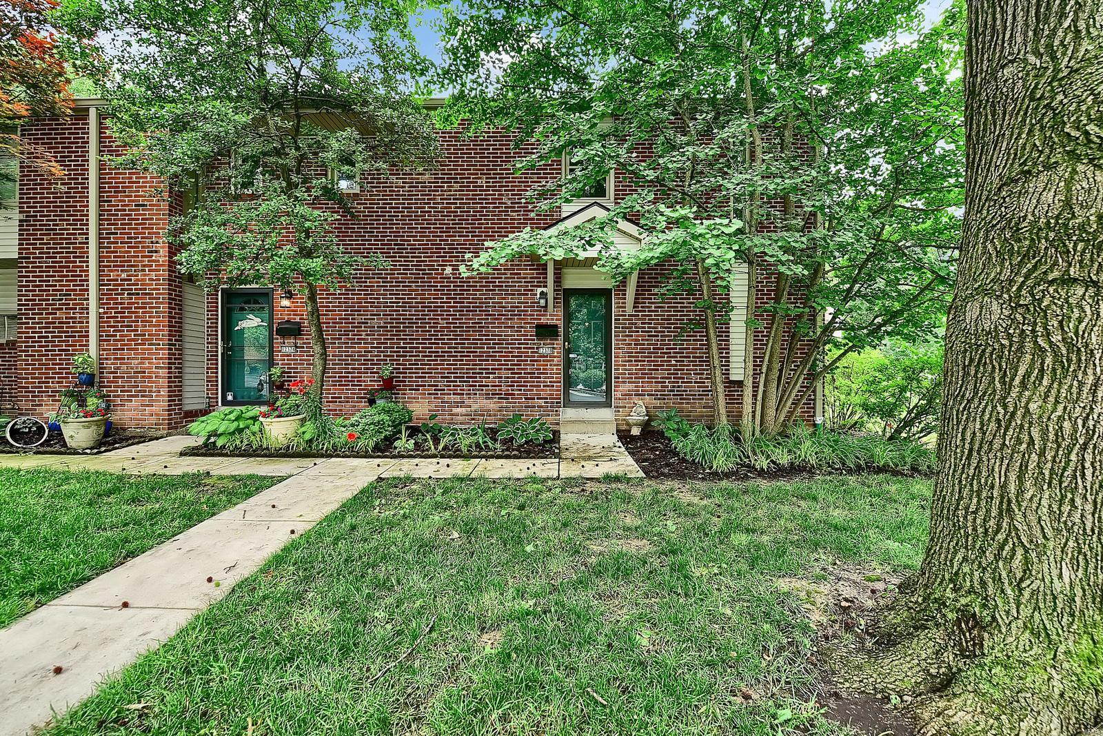 Welcome home to this move-in-ready, townhouse-style condo with privacy-fencing around a large patio with gate to common grounds.  Perfect for outdoor cooking, gardeners, pet lovers or both!  Located in the heart of Creve Coeur with highway access to Page ext, 40/64, 70 and 270 ALL within minutes.  Excellent Parkway schools.  Enter onto the recently updated wood laminate flooring which flows through the living room, separate dining room,  and kitchen.  Kitchen features newer dishwasher and electric stove/oven!  Amana Refrigerator to stay.  Updated half bath on main floor.  Upstairs offers 2 bedrooms, ample closet space and an updated full bath.  The lower level can serve as a recreational room and provides possible extra bedroom or office and a half bath.  Updated windows, plumbing stack, newer hwh, newer carpeting and more!  When this home is your own, enjoy the tennis courts, in-ground pool and fantastic location.  Saturday, June 8th, OPEN HOUSE FROM NOON TO 2. Location: End Unit, Suburban