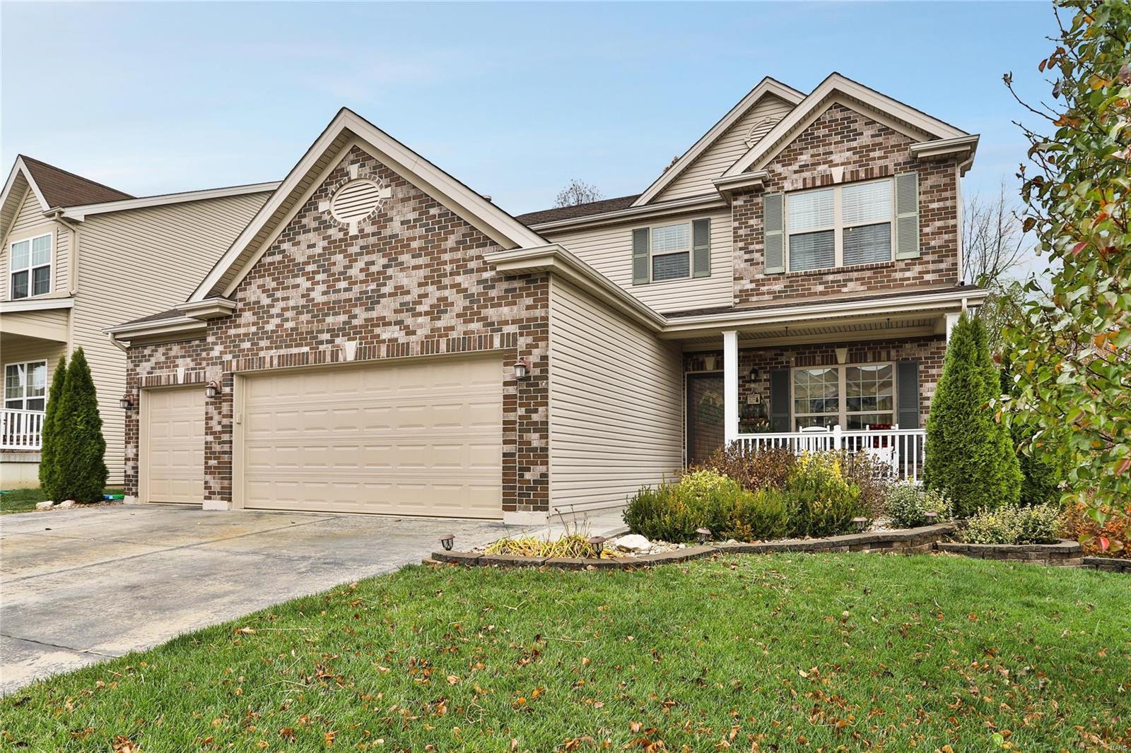 This house is loaded with extras!! Seller custom built this home with builder!!! There are so many incredible upgrades that if you tried to build this home today you would pay much more! This home offers 3 ½ Car with Finished Garage and Epoxy Floor, Two Full Kitchens, 3 Laundry Rooms, 9' Ceilings at the First Floor, Gorgeous Hand Scraped Hardwood Floors, Granite Counter Tops w/Tile Back Splash, Wall Oven w/Separate Cook top, 2 Panel Drs, Open Staircase w/Wrought Iron Spindles. The lower level has a Family Room, Dining Rm, Full Kitchen, Bedroom, Full Bathroom, and Laundry. The Second Floor Master Bedroom suite is over sized with large walk in closet(10 x 6), and Double Dr Entry to the M Bath w/ Double Bowl Vanity, Walk In Shower, Heated Jetted Whirlpool Tub. The rear yard features a large patio with pergola. So much more! This is a must-see! Total finished Square feet 3,163!! Curtain Rods and Hardware not included. Pets applicable please make appointment ahead of time.