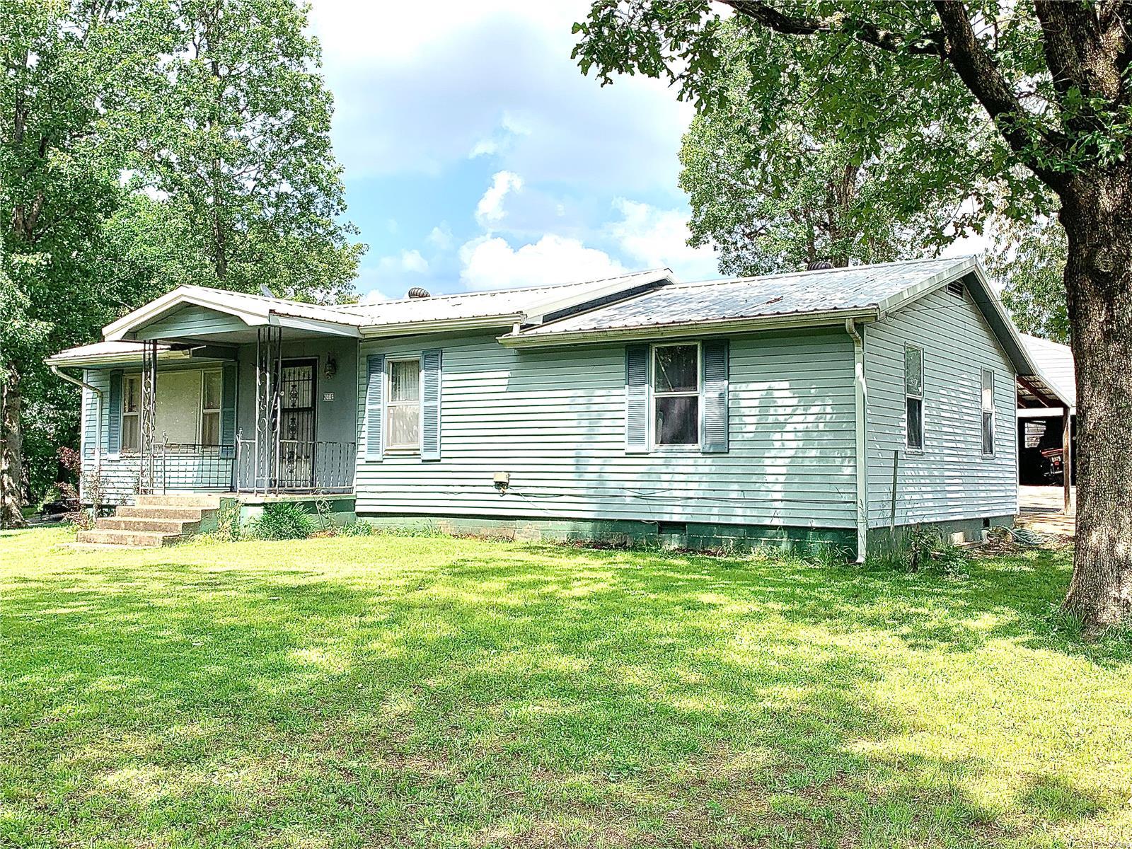 Reduced!! And priced to sell!! Motivated Seller!! 3 bedroom, 2 bath, ranch style home in convenient location.  Vinyl siding, some newer windows, metal roof, large detached garage, privacy fence around back yard, 1 car carport.  Main floor laundry. Motivated Seller so make an appointment to see today.
