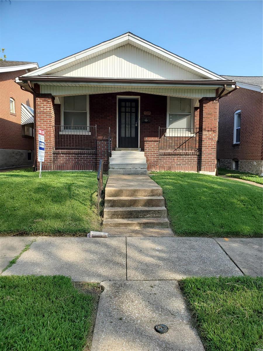 Mrk Rmks: Welcome to 5048 Tennessee in South City! PRIDE in Ownership definitely shows in this 2 plus bedroom 1 full bath brick home with a huge New walk-in closet and freshly stained hardwood floor  Beautiful stained glass sidelights & transom. The living rm offers  gas fireplace & mantle that lead to the large formal dining rm . A updated kitchen with new laminate flooring,  The walk-out basement. Extra charming details like beautiful solid wood doors. Add’l features include updated electrical panel, updated windows, Newer roof & the list goes on and on! Convenient to Carondelet park, downtown & more. This is a MUST HAVE!