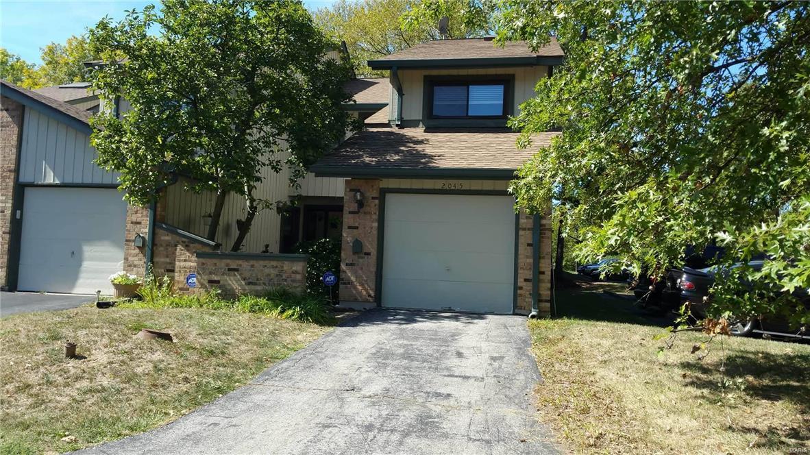 Beautiful end unit townhome nestled in tree lined Rush Creek subdivision. Largest floor plan; boasting 3 bed & 3 bath.  Main floor has new flooring and welcomes you into the foyer area. Neutral kitchen w/ newer cabinets, countertops & SS appliances.  Separate eat-in kitchen with garden window. Open Great rm/dining rm w/ the large back patio/landscaped and fenced. Special cedar millwork and large skylight leading upstairs. Huge master bedroom with walk-in closet, on-suite bath with tiled shower and skylight.  Huge bonus: private deck off master bdrm with wooded view. Finished lower level is warm and cozy; includes wetbar, laundry room & storage. Subdivision pool, basketball court and pavilion. Close to Creve Coeur Lake/Park, restaurants, shopping & Westport. It's all right here and waiting for you.