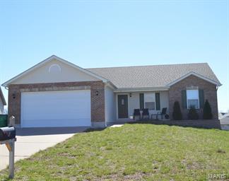 Beautiful Custom Ranch Home, tastefully decorated, great floor plan, and move-in ready.  The foyer will lead you to the open family room with beautiful wood flooring and cathedral ceiling.  The kitchen boast custom cabinets, large breakfast bar, dining area and french door access to large back deck.  The main floor laundry will lead you to the over-sized 2 car garage with work area.  Master bedroom has walk-in closet and master bath suite.  Two additional bedrooms and a full bathroom complete the main floor.  The Basement is ready to be finished with a walkout to back yard and a rough-in for a 3rd bathroom.  Six panel doors, covered front porch, back deck, patio and located on a cul-de-sac road.