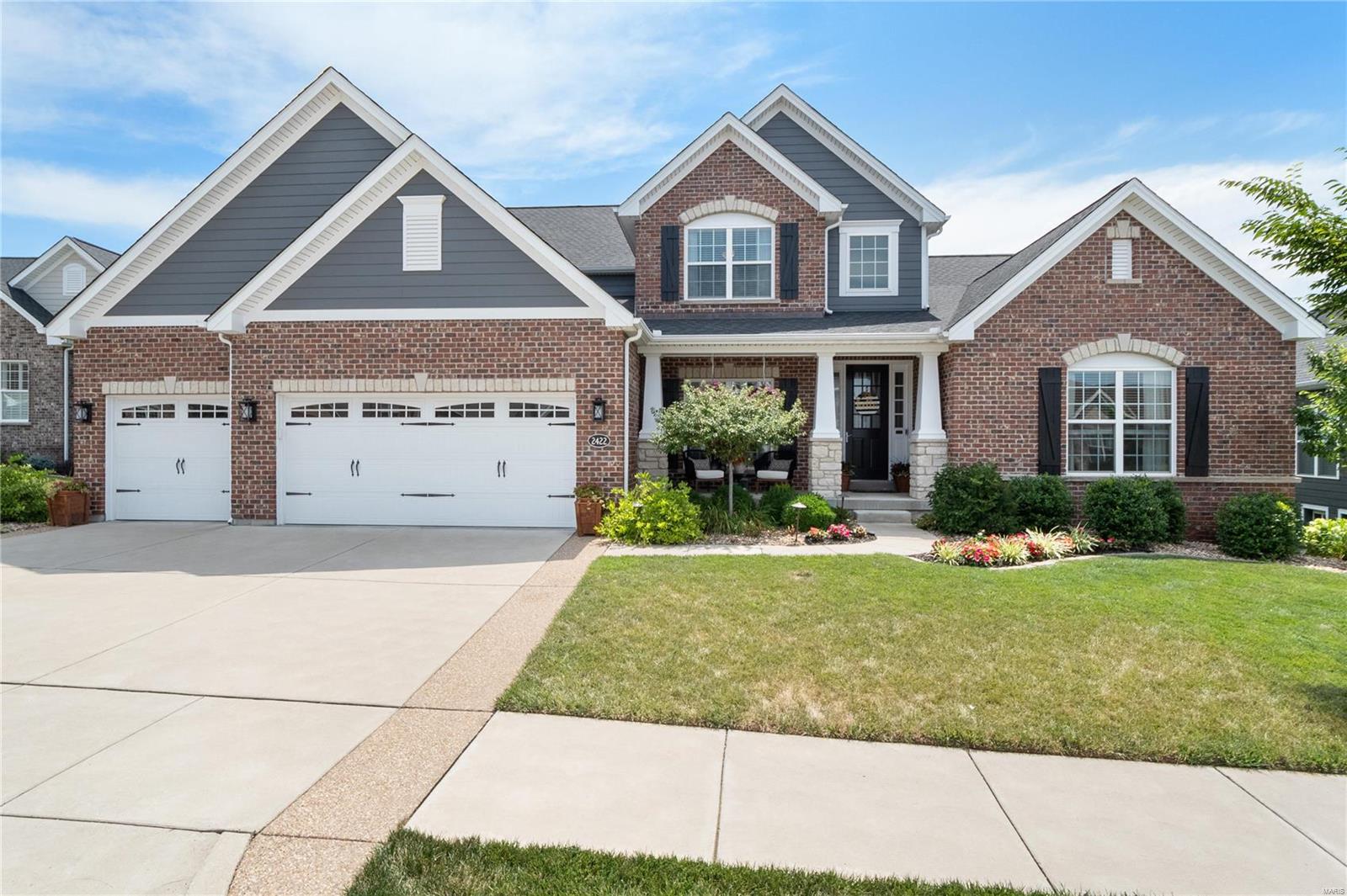 Spectacular home, fantastic location! At only 4 years old this 4 bed, 3.5 bath, 3,825 s/f, home features a main floor primary suite & todays most desirable finishes. The gourmet kitchen boasts on trend custom white cabs, tile backsplash, granite counters, apron sink, walk in pantry & large accent center island opening to sunny breakfast rm w/ custom dry bar. Great rm w/ 11' ceiling sports an incredible gas fireplace flanked by custom built ins. Primary suite is a dream w/ stunning accent wall, walk in closet, luxurious bath w/ double vanities, gorgeous custom tile walk in shower, & soaking tub. The UL features 3 bedrms w/ walk in closets, 2 full baths, & enormous rec rm, perfect for kids & teens. Outside you will find a maintenance free deck overlooking the fully fenced yard w/ stamped patio & built in firepit. Other features include James Hardie siding, main fl laundry w/ custom cubbies, built in speakers, oversized 3 car garage, sprinkler syst, deep pour walk out LL w/ rough in. Wow!
