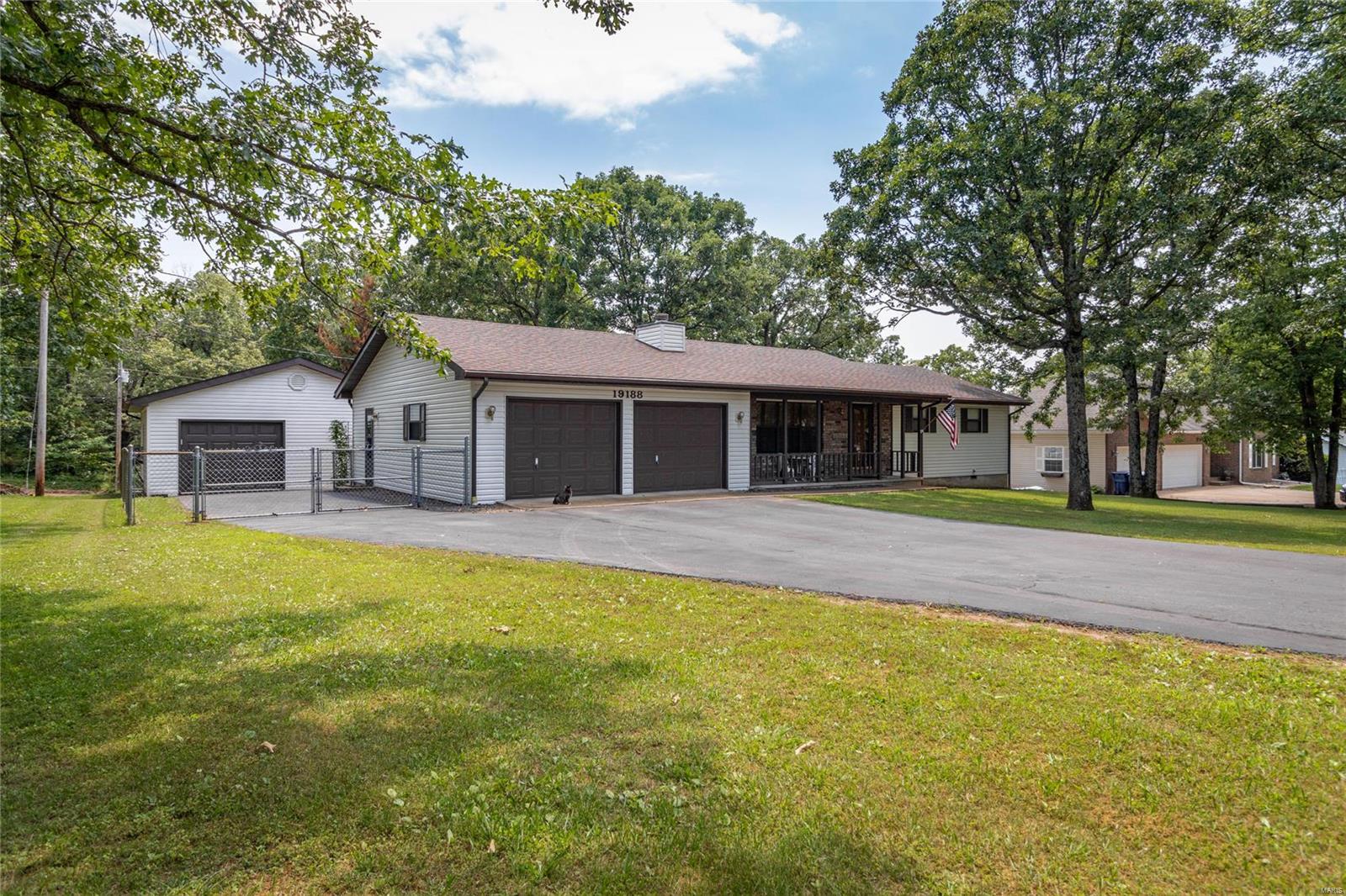 This is the one everyone has been looking for!!  This turn key property is located just outside the city limits on a large half acre lot. Home contains 3 bedrooms and 2 baths, new roof, new siding, oversized 2 car attached garage, plus a pull through detached workshop with heat and air.   As you enter the home you'll love the wood floors, cathedral ceiling with wood beams and gas log fireplace. The kitchen contains beautiful granite counter tops, GE Graphite appliances, pantry, breakfast bar, room for large dining table, tray ceiling, and sliding glass doors leading out to the freshly stained deck.  The large master bedroom contains a walk in closet and full bath.  You'll find two additional bedrooms next to the master and a guest bathroom with tile floors.  The exterior of the property has a chain link fenced yard with garden spot and an additional storage shed.  You don't see homes like this on the market often!  Schedule your showing today! Additional Rooms: Mud Room