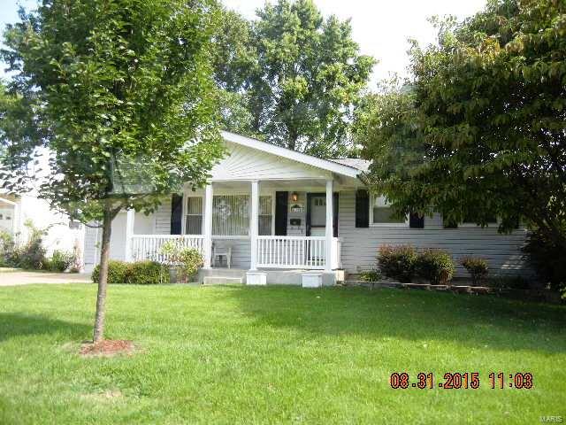 New price! Shows beautifully! Spacious covered front porch leads into an open and inviting floor plan! This house has been freshly painted, newer carpeting on main floor, ceiling fans in bedrooms and dining room, and more! Originally a three bedroom floor plan, the third bedroom is currently a dining room off the kitchen. Partially finished basement has a dry bar area, family room and a bath with shower. There are many updates to the home including: vinyl exterior siding, enclosed soffits, replacement windows, doors, and a high efficiency furnace. Vinyl replacement windows are a plus! The kitchen overlooks the large fenced back yard with two storage sheds. Enjoy summer evenings on the covered back patio! Centrally located in the city of Florissant! This home is ready for a new owner!  (Washer/dryer, refrigerator-Appliances as displayed, sold as-is) Currently the third bedroom is being used as a dining room, closet remains, wall can be replaced, address in contract.