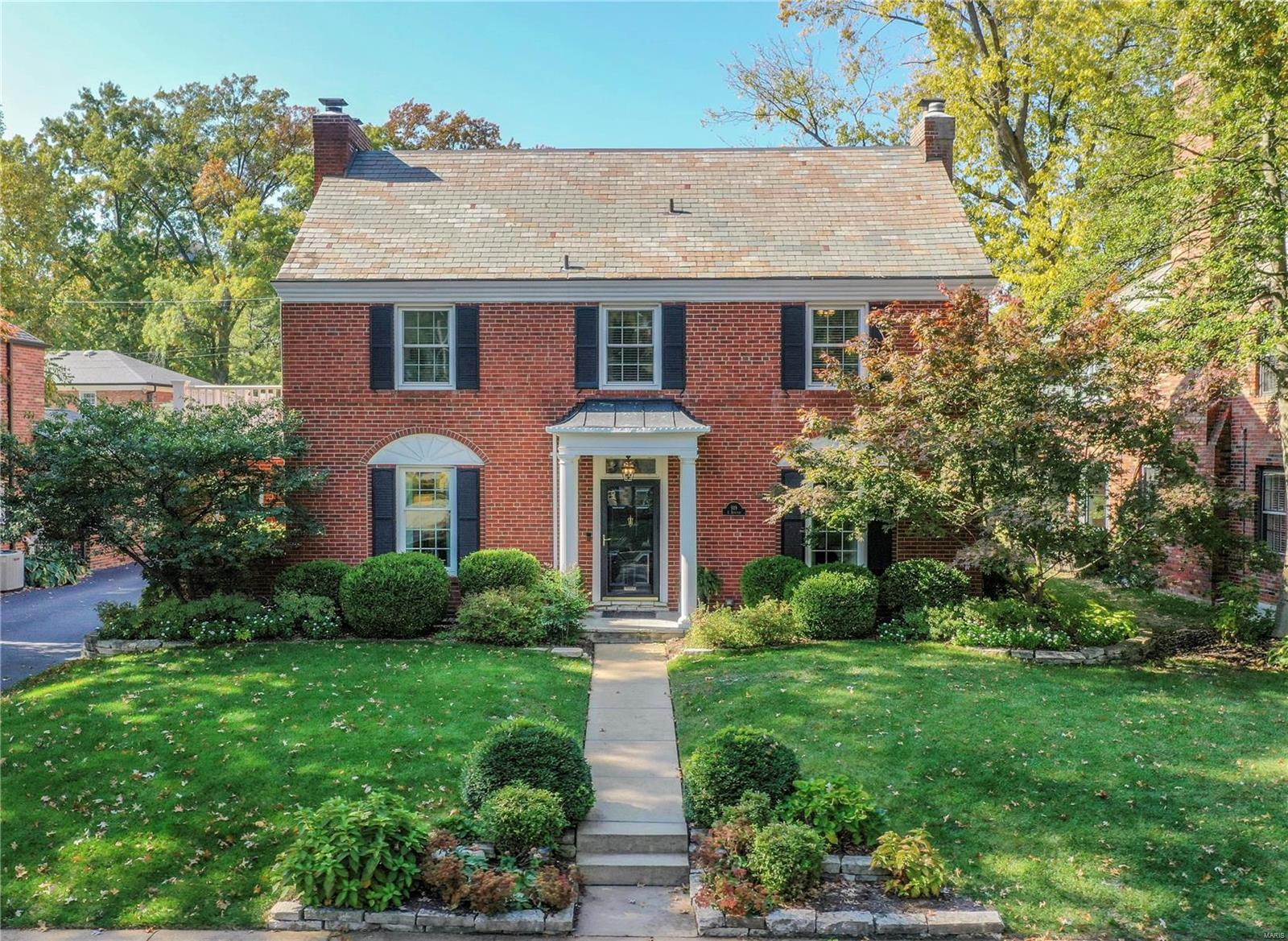 It’s easy to see why this sophisticated 2-story is the perfect place to call home.  On gorgeous grounds, in sought-after Davis Place neighborhood. Inside, you'll live comfortably surrounded by stylish neutral décor, extensive architectural details & modern updates throughout. Rich hardwood floors predominant. Elegant dining room. Expansive living room with extensive moldings, gas fireplace, french doors. Cozy den with built-ins & heated tile floor. Chef’s kitchen has abundant custom white cabinetry, gorgeous marble counters, stainless appliances & more. Breakfast room with bay, banquette seating and butler’s pantry. Stylish powder room. Upstairs find the primary suite, a peaceful retreat with a spacious sleeping area, dual closets & luxurious spa-like bath. Three more spacious bedrooms & stylish hall bath. Lower level has a large recreation room with gas fireplace & dry bar.  Home has been meticulously maintained & updated, including kitchen & all baths remodeled, windows, hvac & more.