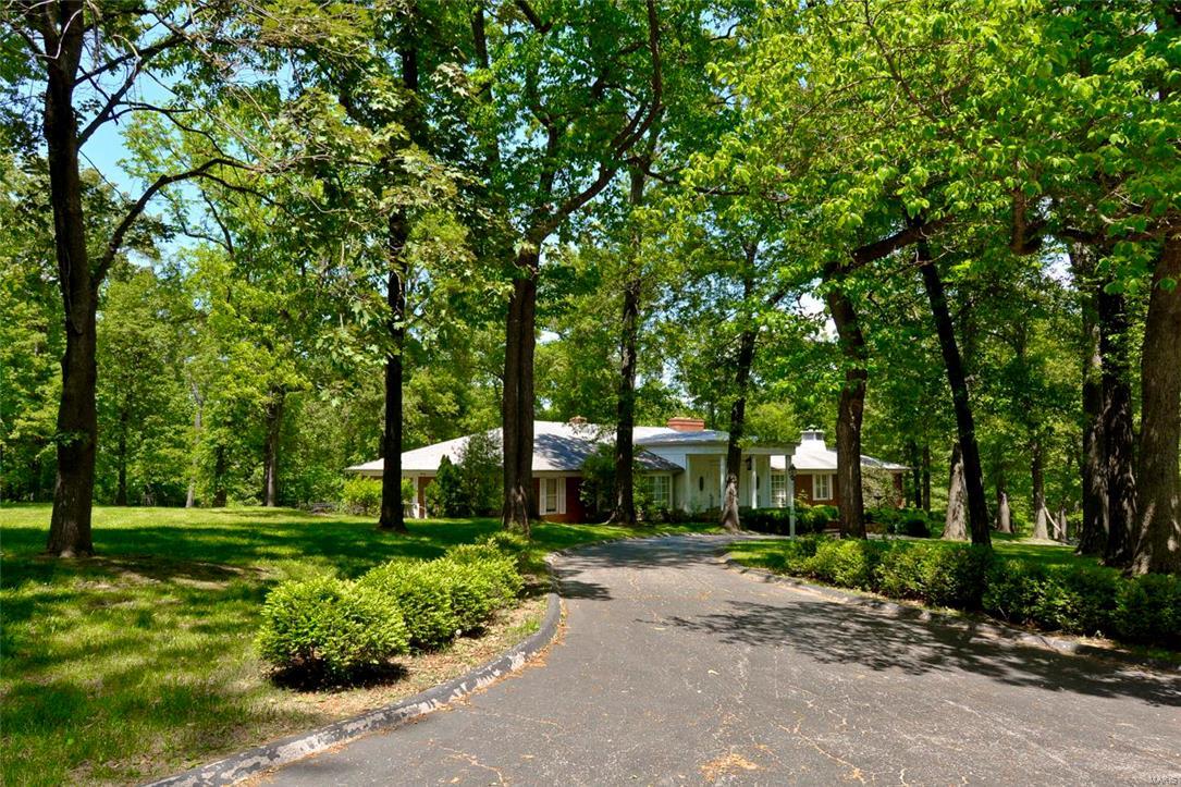 LOCATION! LOCATION! LOCATION! Priced to sell! 3.47 Acres Prime buildable lot!  Build your dream estate here!  Premiere area in Ladue off Log Cabin Lane * Rare opportunity to restore or build your own spectacular custom home on this gorgeous private 3.47 ACRES in the heart of Ladue!  Level & Gently sloping tree private acreage * Private Gated Access to Hwy 40 * 10 minutes to airport! * Live near Ladue’s horse trail * Build it here!