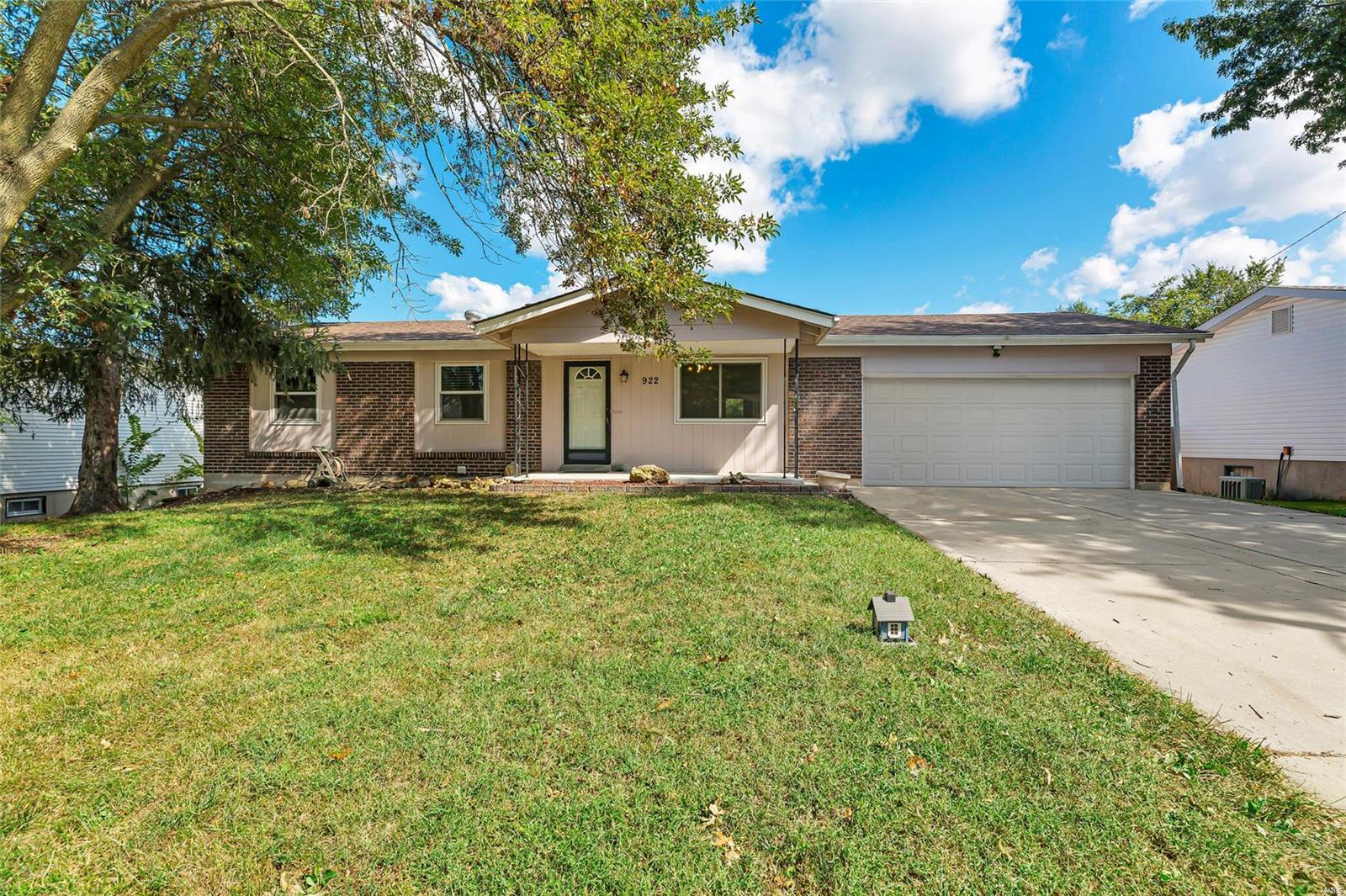 Ranch home with walk out lower level and great yard! Laminate flooring in main living area, open floor plan. Three main floor bedrooms, two main floor full baths, master bedroom with dual closets, nicely updated master bath. Partially finished lower level with another full bath, lots of storage space, and extra living space. Lower level glass slider walks out to a patio. From the deck enjoy the  level back yard with an above ground pool, pond, large shed, and fully fenced. Two car garage, newer windows and roof.