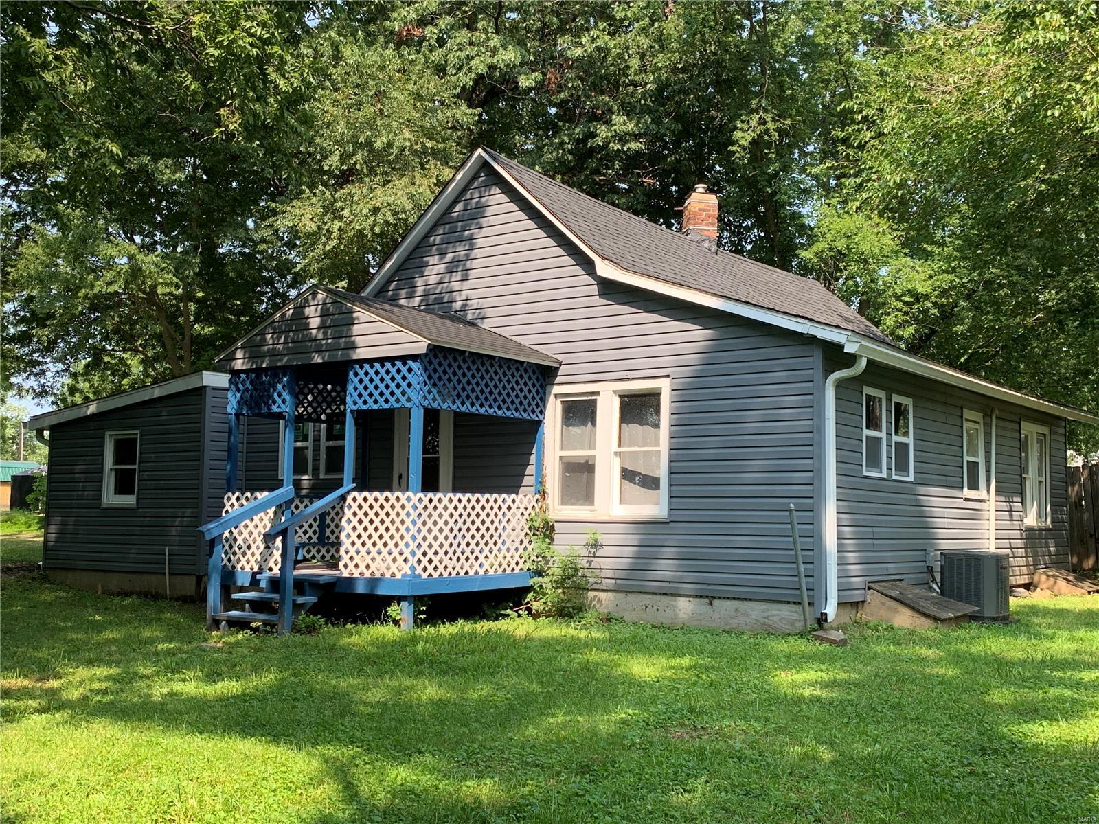 Looking for privacy, this might just be the house for you.  This 3 bedroom, 1 bathroom home features many updates throughout.  The kitchen is completely new including the appliances.  The AC unit, and furnace are both new and the roof was just put on a week ago.  Some windows have been replaced there are still some original windows.  The laundry room is just off the kitchen on the main level.  No reason to go to the basement unless you want to store items there.  Affordable living with privacy.
