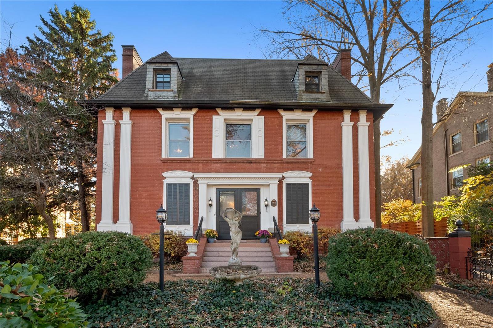 Live on one of St. Louis’ grandest streets, rich with history and elegant architecture in sought after Compton Heights! Wonderful neighborhood activities for families to enjoy! The exterior was modified to a New Orleans colonial with wrought iron, fountains and courtyard with inground pool and carriage house. Newly renovated master bath with separate shower/tub, dbl vanities and fireplace! Enjoy the charm of the many historic highlights...dining room with rounded walls, extensive moldings, hardwood floors, marble fireplace surrounds, built-in bookcases and stained glass windows! The 2-story great room is a wonderful gathering spot complete with a gas fireplace. Plenty of sunlight in the gourmet eat-in kitchen with french doors leading to the courtyard and covered porch.  Four more spacious bedrooms and 2 full baths complete the upper levels along with a huge rec room on the 3rd floor. The finished lower level has a family rm, kitchenette and full bath.