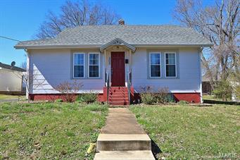 Beautifully restored bungalow, could be 3 bedrooms or 2 bedrooms with a sunroom/den.  Within the last few years many improvements have been done to this home including updates to the kitchen, bath, windows, paint, floors, roof, heating and cooling, and water heater.  Full basement,  beautiful hardwood floors and built-ins.  All appliances included---even the washer/dryer.  Absolutely move-in condition with no work to be done!  Quiet, convenient location lets you walk to restaurants, banks, post office and shopping. Adjusted square footage is 1,155.  Call today for your personal showing. Additional Rooms: Sun Room
