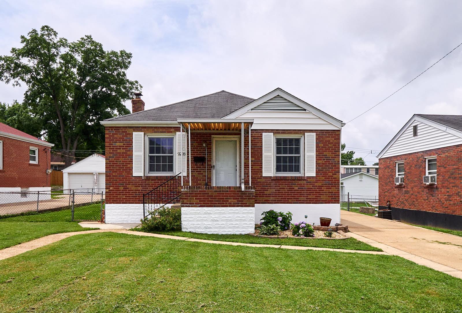 Move right in to this adorable brick bungalow.  New flooring and fresh paint throughout the home. Dining room and adjoining living room create open floor plan which allows lots of natural light into main living area. Beautiful stained glass windows in living/dining rooms. Spacious kitchen has new flooring and a pantry. Bonus room off of the kitchen can be 3rd bedroom, office or can remain family room. Lower level is very clean and has plenty of storage and could be finished to add additional living area.  Large level back yard has storage shed, deck, a raised garden bed, and is fully fenced. There is plenty of off-street parking on cement driveway. Schedule your showing today!