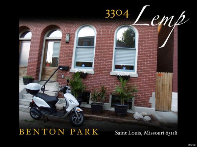 Updated Benton Park Row House. AS-IS SALE! Enjoy this wonderful large open floor plan w/many high-end finishes. It offers a stunning kitchen with granite counters, stainless steel appliance, large island with gas cooking, custom cabinetry and a good sized pantry.  There is a half bath on the 1st floor, a deck for summer BBQ's and a fenced back yard with motorized gate allowing for secure parking of three or four cars. The first floor has bamboo flooring. The 2nd level has (3) nice sized bedrooms, one full bath located in hallway that features a dual sink vanity with concrete counter top. There is also a private laundry closet with washer/dryer in hallway and a deck off the back bedroom. The basement is a cool space that is partially finished & also has lots of unfinished storage. Enjoy walkable hip Benton Park living with access to restaurants, bars, cafés and so much more. Cherokee Street, Soulard, the Brewery, Downtown and so many other cool things in the city are all within minutes.