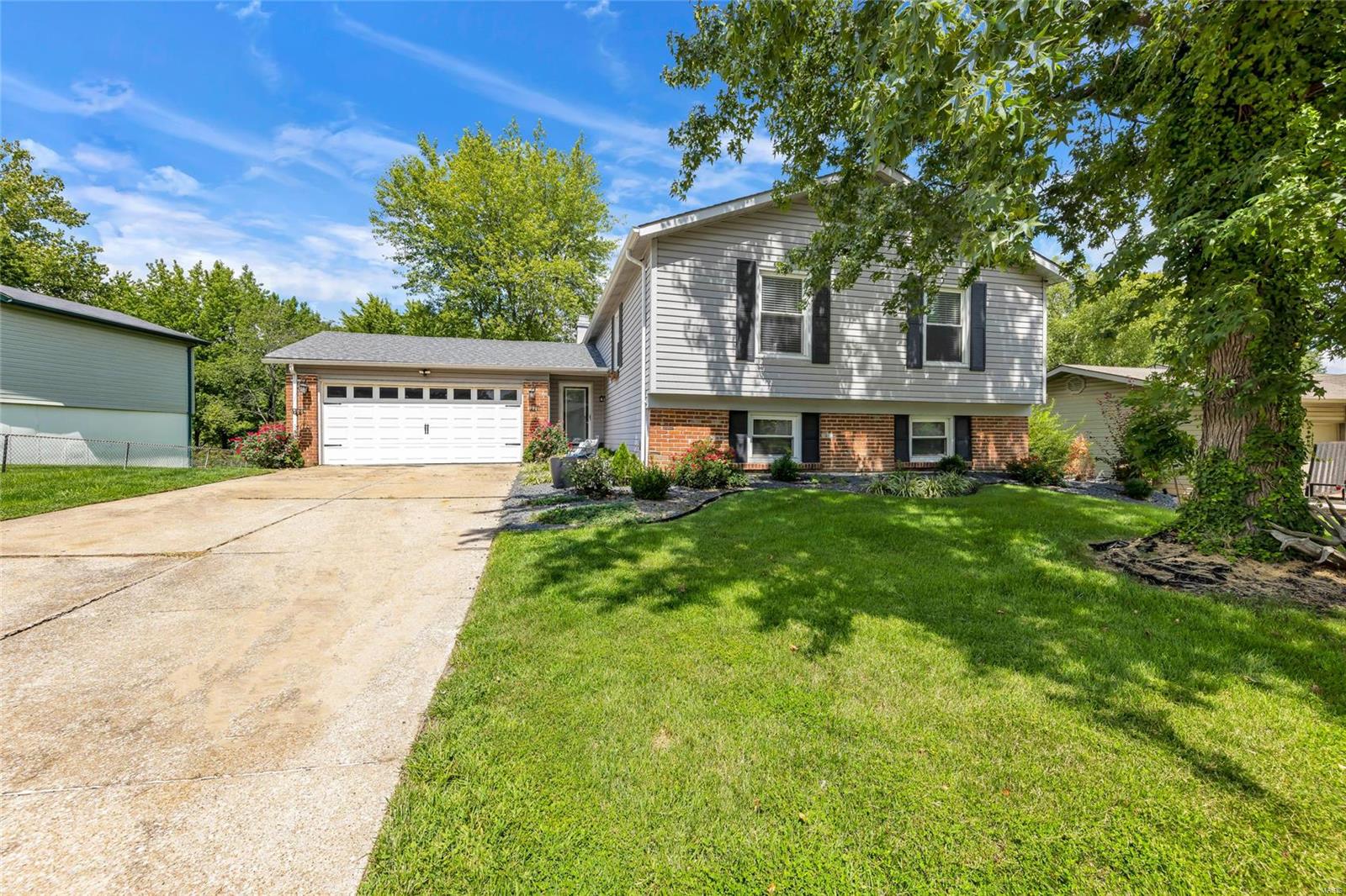HANDY BUYERS AND INVESTORS! OPPORTUNITY KNOCKS! With repairs, this home has a ton to offer! Similar homes nearby priced in the $280’s! 5 beds and 3.5 baths in the highly sought-after Millwood Subdivision of the Francis Howell School District. You'll be in the heart of St. Peters and just a short walk to Laurel Park with its City Pool, Trails, Playgrounds and more! This home has been remodeled for an open concept with stylish new kitchen, large island and gorgeous hardwood floors. Down the hall, you'll find the Master Suite with a new shower insert, 2 additional bedrooms and a 2nd remodeled full bath. The walk-out lower level boasts a spacious rec/living area with fireplace and ½ bath. The lower level extends to 2 additional bedrooms or guest quarters and a 3rd full bath. Step out to the partially fenced yard backing to common ground with park-like views. Conveniently located near Highway’s 364, 70 and the Paige Extension. SOLD AS-IS.