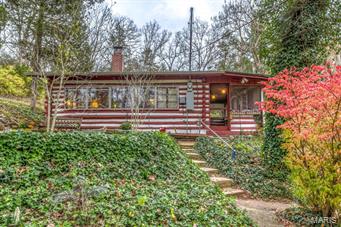 Are you looking for a weekend get-away? Or how about a year round resort type home? Do you like the older log home look? Check out this cozy log home which sits on a little over an acre that is surrounded by trees. This home is located within an hour of downtown. The community has four lakes for fishing and swimming, plus there is a community center and ample opportunities for weekend bonfires and cookouts. This home could easily be a three bedroom home and the porch could be enclosed to enlarge the kitchen area. We think this one will go FHA, VA or USDA financing.