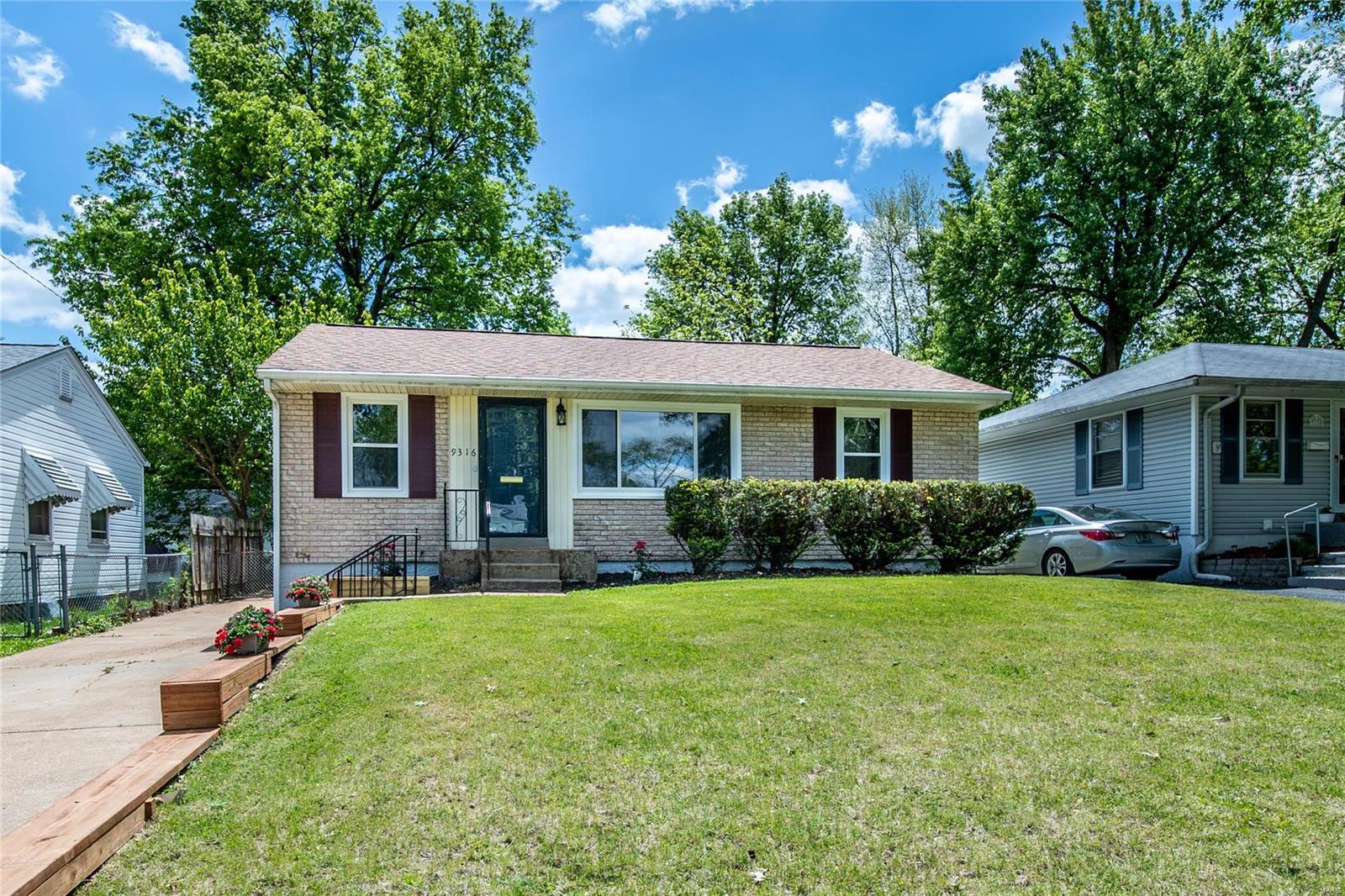 Welcome to this charming, updated, move in ready home. Upon arrival, you will be greeted by the great curb appeal of the house that boasts new widows and shutters. A large living/dining combo with hardwood floors to welcome you as you enter. As you walk farther into the house, the living room opens to the stylish kitchen, which has been totally remodeled with plenty of storage and counter space as well as new appliances. Two bedrooms with hardwood floors and an updated bathroom completes the main level. Fresh paint throughout, new windows and other updates around every corner of the home. Partially finished, dry basement with ton of storage. Large leveled and fenced back yard with a concrete patio that is perfect for entertainment. All of this plus located close to shopping, dining, entertainment, and major highways. The only thing missing is YOU!
