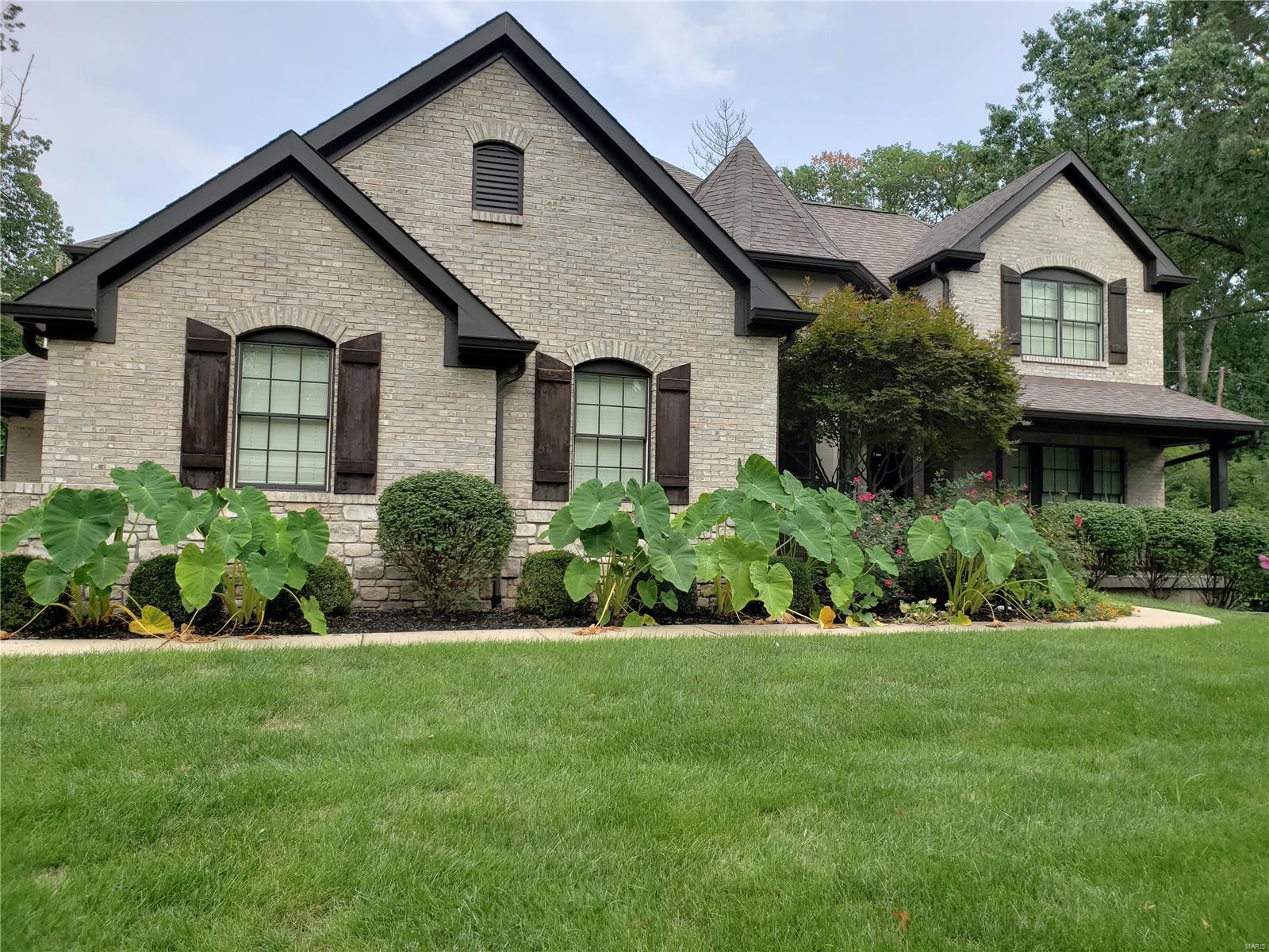 Spacious newer 4BD, 4.5 bath, 1.5-story gem featuring 5,974 SF of living space on 3 level and a 3-car garage!  Located in  Ladue Schools, this home is loaded with upgrades and is situated on a wooded lot and backed by the Home Protection Plan.  You will enjoy the center island granite kitchen with stainless appliances, a main floor master with luxury bath including a rain head shower & body sprays, refinished wood floors, and fenced rear yard with custom playground. The upstairs includes 3 bedrooms, 2 baths and a bonus/loft area.   The wonderful finished LL features a rec room, playroom, mirrored exercise room, 4th bedroom, and multiple built-in storage areas. Other amenities include a main floor laundry plus mudroom with cubbies, custom closets, zoned HVAC, security system, extensive new landscaping with accent lighting, and outdoor speakers.  Attractive tree-lined neighborhood convenient to highways, hospitals, shopping and restaurants. Welcome home! Additional Rooms: Mud Room