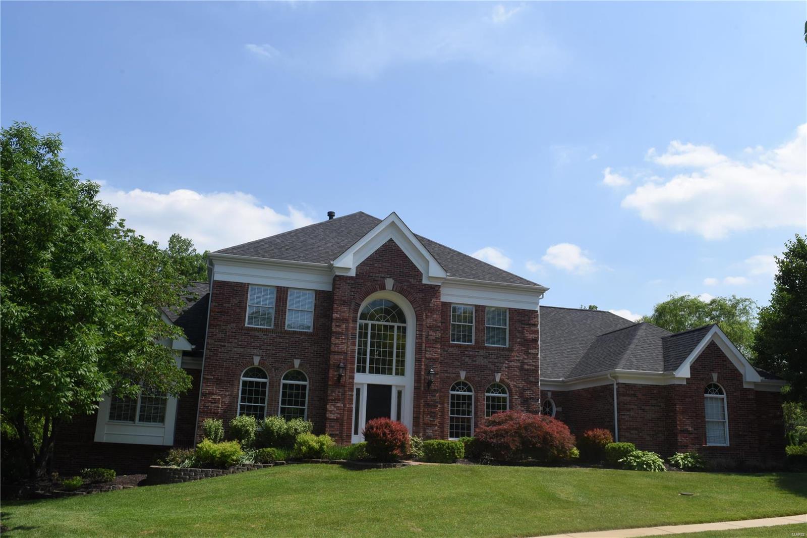 Steal this house!  Over $220,000 in updates!  Stunning 1.5 Story. Beautifully landscaped yard in a great neighborhood. Grand 2 story entry w/ curved staircase flanked by formal dining room and formal library/study with hand stained multi width hardwood floors. Spacious 2 story great room has oversized fireplace, wet bar, crown molding, and rear staircase. Incredible totally remodeled gourmet kitchen w/ exquisite cabinetry, granite countertops, commercial grade stainless appliances, a huge custom island, tile backsplash, vaulted ceiling, walk-in pantry and breakfast room. Adjoining hearth room is perfect for entertaining or everyday living. 1st floor master suite w/ beautiful private ensuite. Upper level has 3 bedrooms, 3 full baths and a loft. Finished lower level has family room, rec room, full bath & bedroom. Private back yard with gorgeous Saltwater Pool, updated landscape and exterior lights, outdoor bar and private deck.  Home was completely remodeled and no expense was spared. Additional Rooms: Mud Room, Sun Room