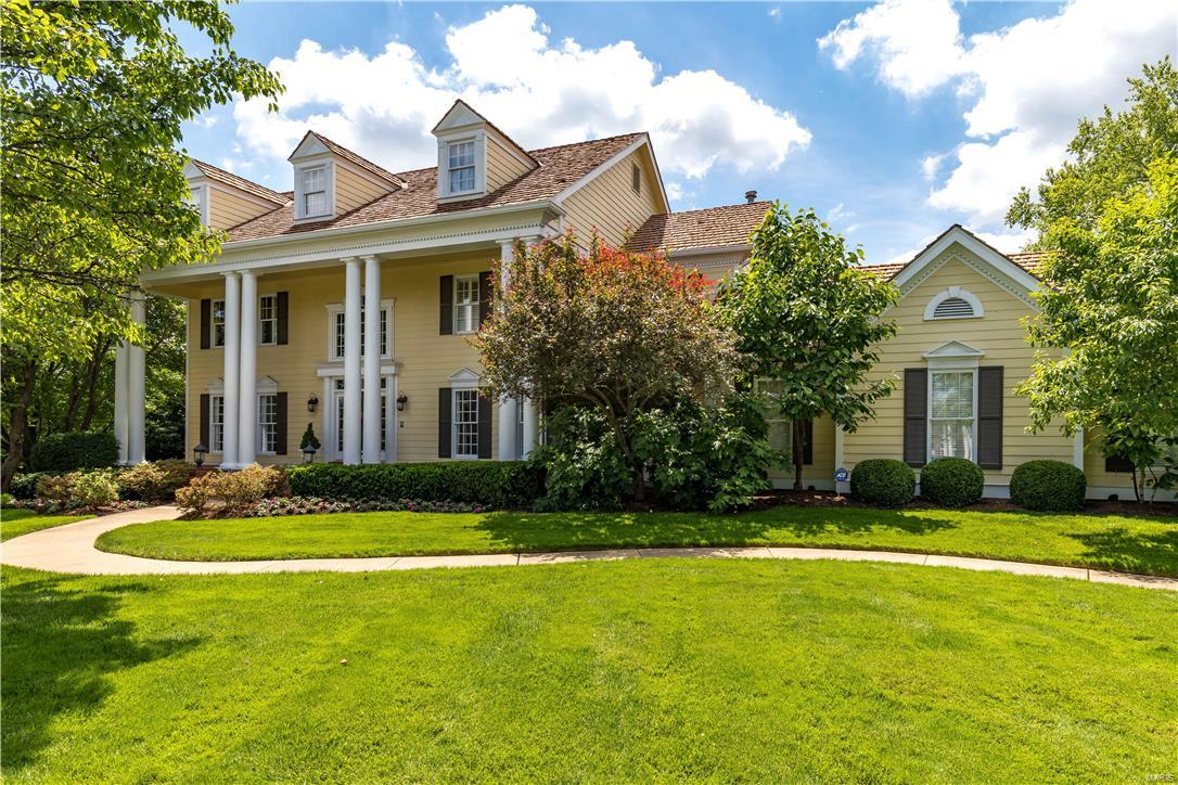 MAGNIFICENT 4+BED 4.5 BATH TWO STORY IN BROOK HILL ESTATES ON GORGEOUS LANDSCAPED 0.5 ACRE CORNER LOT HAS BREATHTAKING 2 LEVEL VANISHING EDGE POOL & PRIVATE OASIS! NEW CEDAR SHAKE SHINGLE ROOF & PROFESSIONAL INTERIOR DESIGN, 4902 sq.ft. living space, this home is STUNNING! EXQUISITE hand painted finishes, custom molding/millwork/cabinetry & antique chandeliers T/O. TWO story foyer opens to den/study, dining w/custom wall fin & built in. Great rm feature gas f/p, beam ceiling, wet bar, custom wine display. Half bath has gorgeous hand applied gold mural! Gourmet kitchen, 42"cab, high end appl, rustic limestone floor! Vaulted sun rm overlooks fabulous Lazy L pool, fountain to lower pool/patio,  gas fire pit. Master suite has coffered ceiling, custom built ins, bubble jet tub. 3 addl beds, wlk/in-c, baths. W/O LL, f/p, wet bar, exercise, bonus, full bath. 3-C garage. Prof landscape services paid thru 2017! IMPECCABLY cared for & MAINTAINED!  Featured in STL MAGAZINE & STL BUSINESS JOURNAL! Additional Rooms: Sun Room