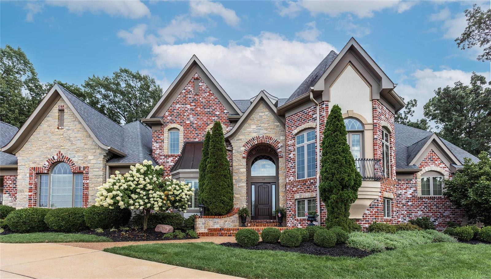 Step into a world of luxury & tranquility w this spectacular custom-built 1.5-story home nestled on 2.4 acres of lush, wooded grounds. Elegant living spaces & warm, inviting private areas effortlessly accommodate your every need. Thoughtfully designed, home seamlessly transitions from tranquil sanctuary to exquisite setting for entertaining, catering to both intimate gatherings & lavish events. Grand entry adjoins elegant dining room & great room w panoramic views. Chef’s kitchen w distinctive custom cabinetry, granite counters, premier appliances. Tranquil hearth room. Extraordinary owner’s suite w picturesque bay, spa-like bath w walk-in shower, whirlpool bath, built-ins. Exquisite office w french doors to balcony. Upper level w family room, 3 bedrooms, 1 ensuite bath, 1 shared. LL w elegant bar, wine room, wine cellar, rec room, theater, exercise room, bedroom, full bath. Amazing saltwater pool & patio overlook lush grounds. 2 garages w 5 spaces. NEW ROOF installed prior to close. Additional Rooms: Wine Cellar