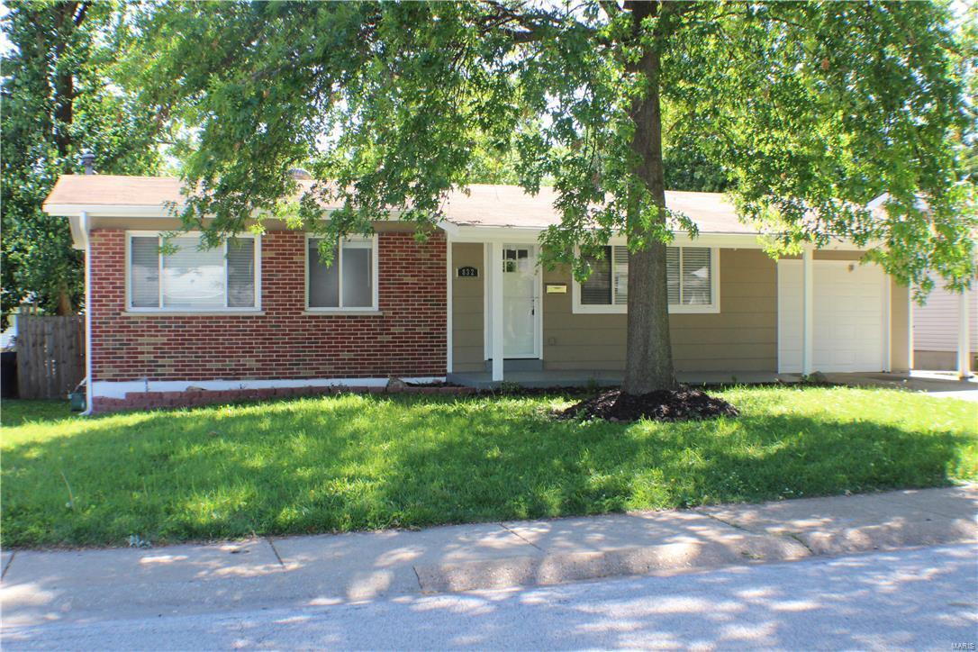 Darling & newly remodeled three bedroom, two bath home! New wood laminate flooring and carpet. Wow! So many features: One remodeled  and one new full bathroom going in - both with gorgeous tile work.  This home also features an attached garage, and extra living space in the basement!   Come see this well-priced beauty today!