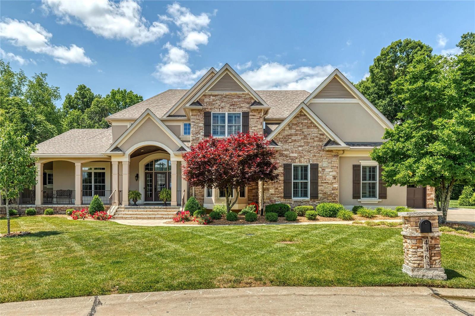Spectactular 8000 sq ft stone & stucco 1.5 Sty from award-winning Arbor Homes. Impressive 2-sty foyer leads to well-appointed study, formal dining room with bay window & striking great room with soaring windows & marble fireplace flanked by built-in bookcases. Designer kitchen with 49” white cabinetry, granite countertops, Thermador appliances, 7’ center island, butler’s pantry & planning center adjoins breakfast room, hearth room with stone fireplace & screened porch. Coffered primary bedroom suite with luxury bath with freestanding tub provides an appealing retreat. Front & rear staircases access 3 additional bedrooms, 1 with ensuite bath & 2 with Jack n’ Jill bath, & bonus room. Lower Level includes recreation room with floor-to-ceiling fireplace & wet bar, game room & media room plus office, 5th bedroom & full bath. Atrium door opens to outdoor living room with grilling station & full-height fireplace, pool bath & resort style pool with waterfall surrounded by landscaped gardens.